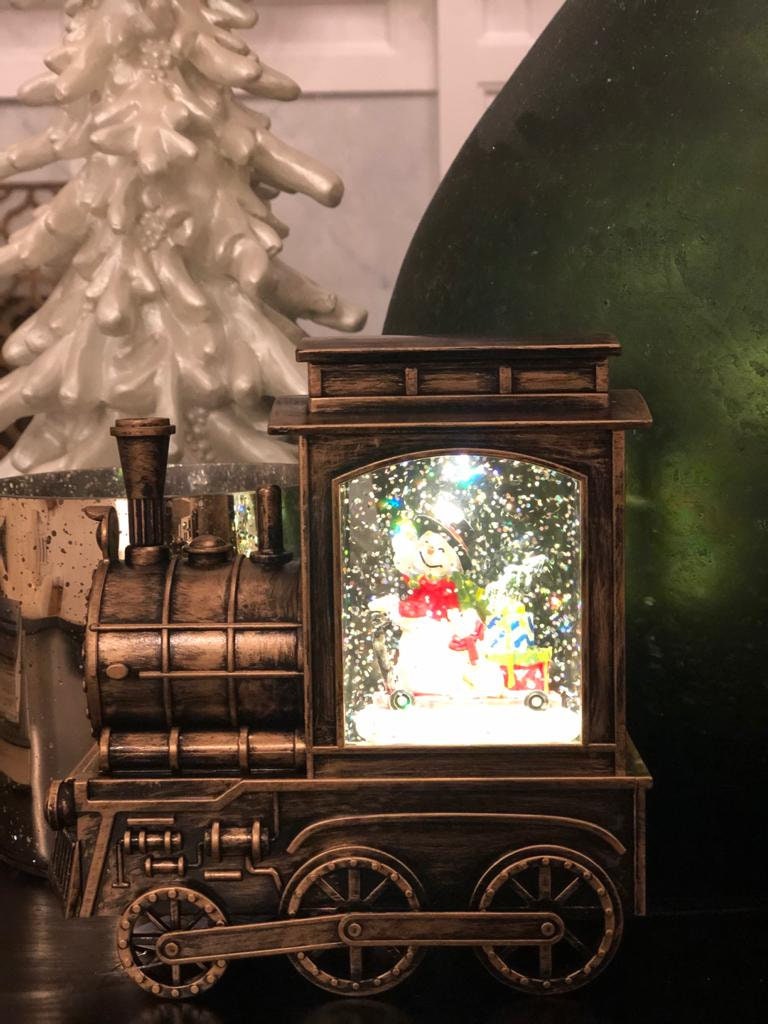 6.75" snowman in musical lighted water train*