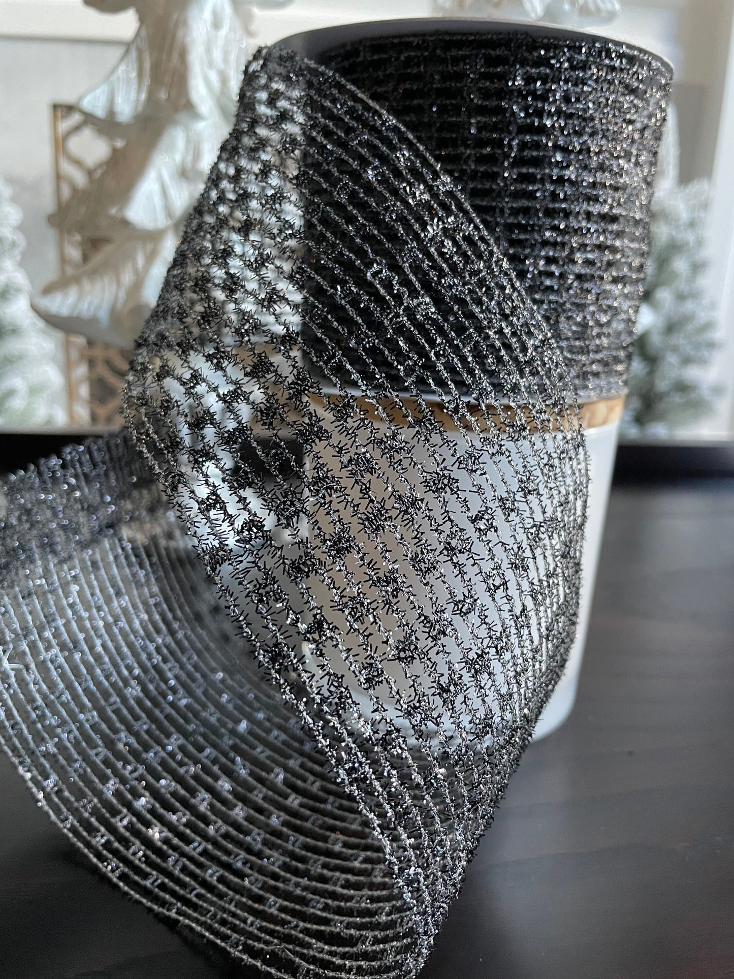 Designer ribbon, black metallic net 4” x 10 yards.*