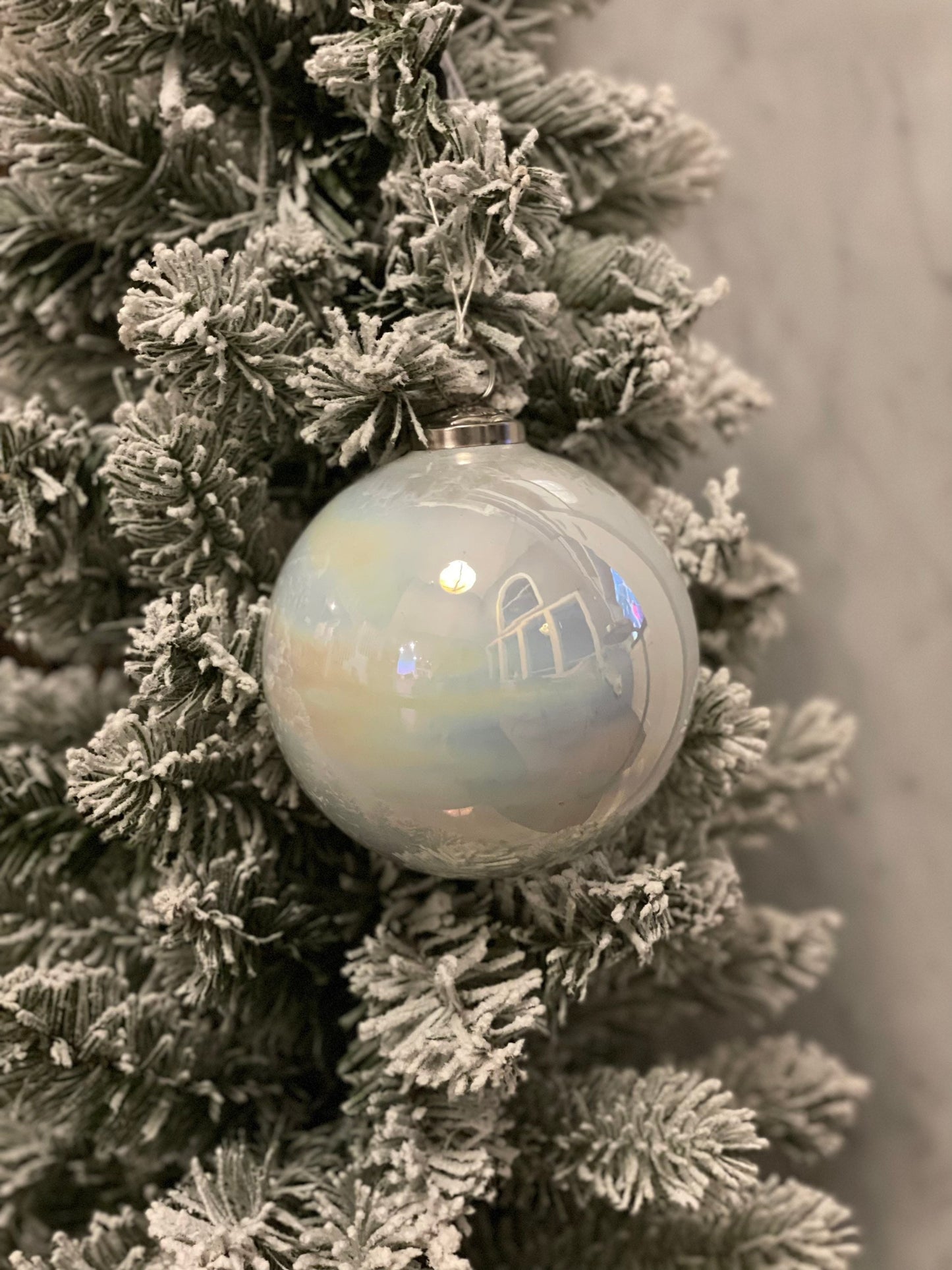 5” glass Iridescent ball ornament.*