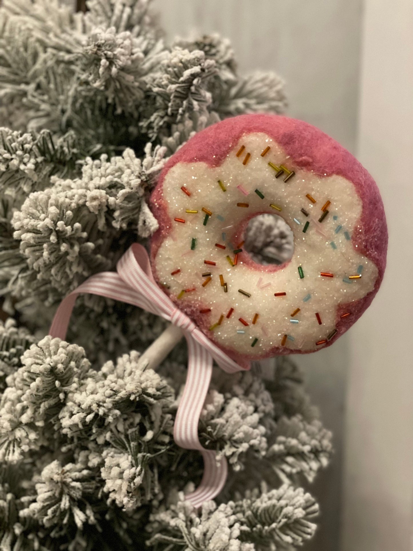18” H x 5.5” D. Pink Dougnut pick ornament.
