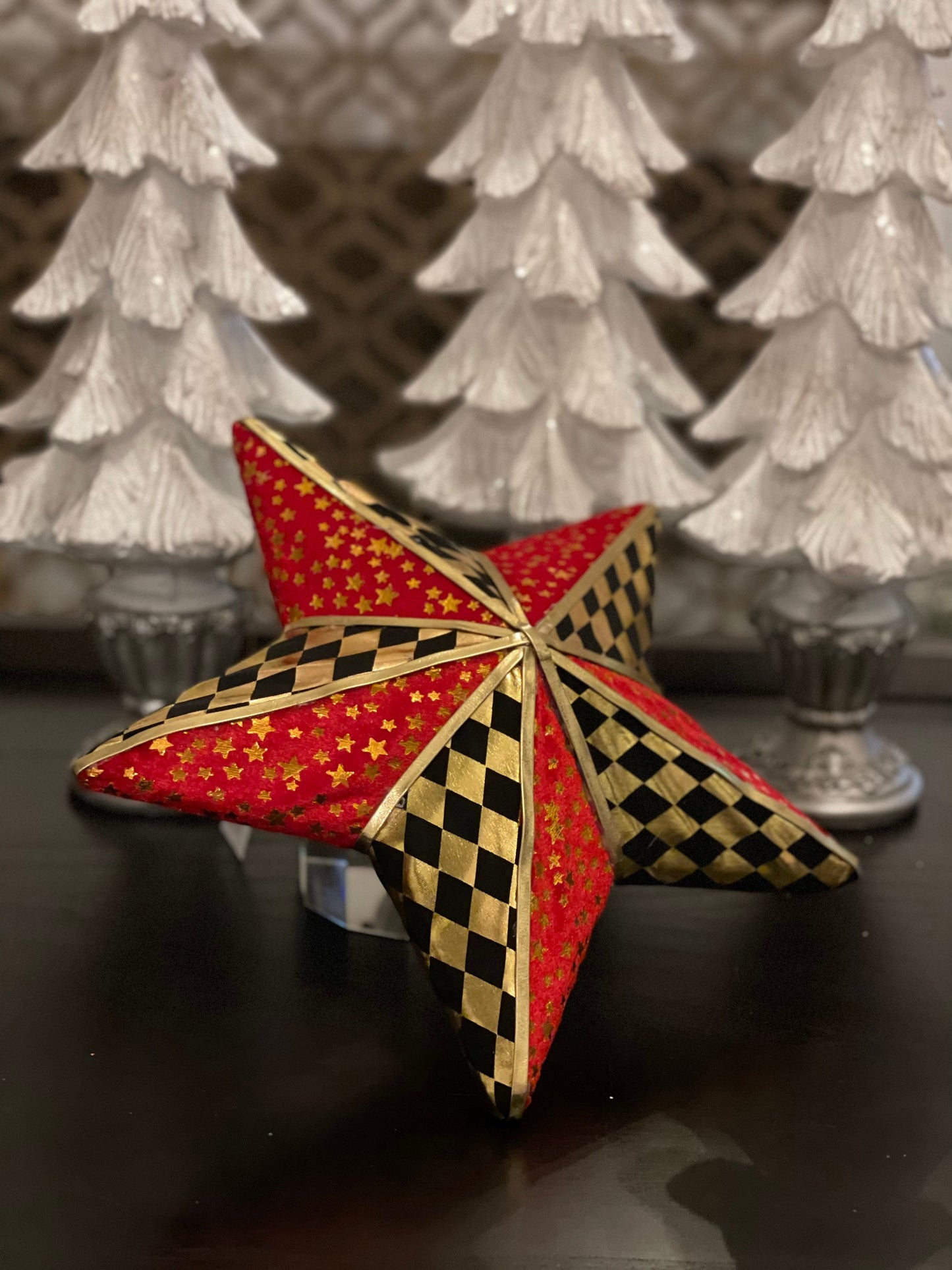 12.5” star ornament. Star checkered red, gold and black.