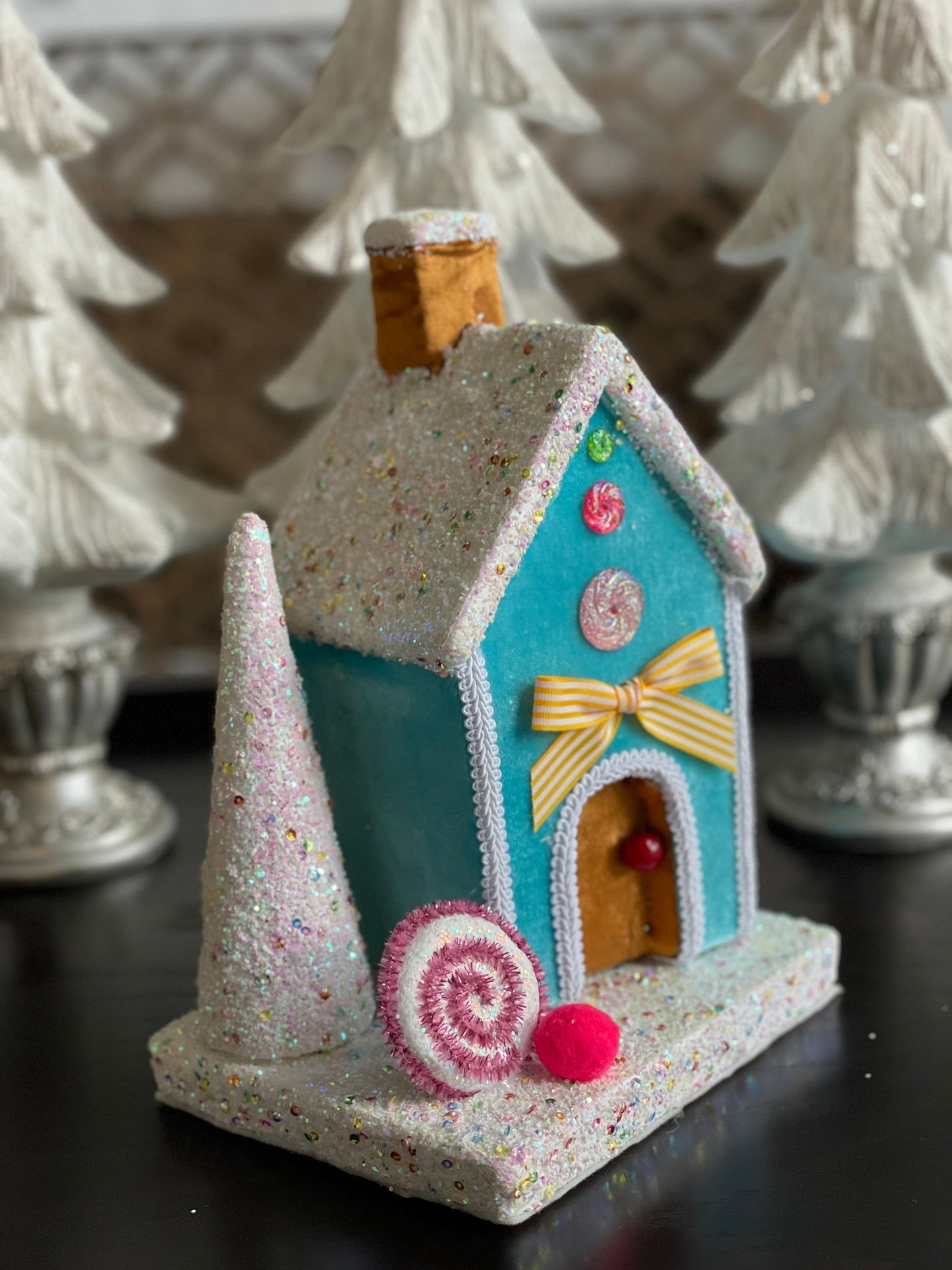 11” Gingerbread house blue with candy and tree. One Candy house.