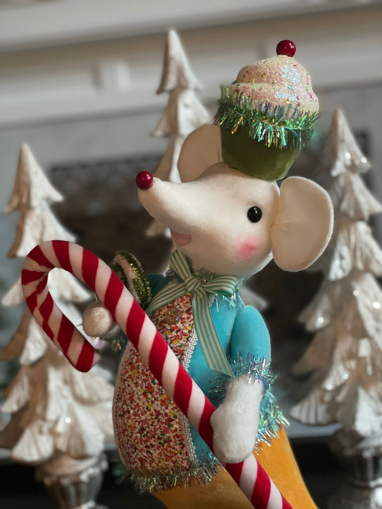 22” H Candy Mouse with blue jacket and yellow pants.