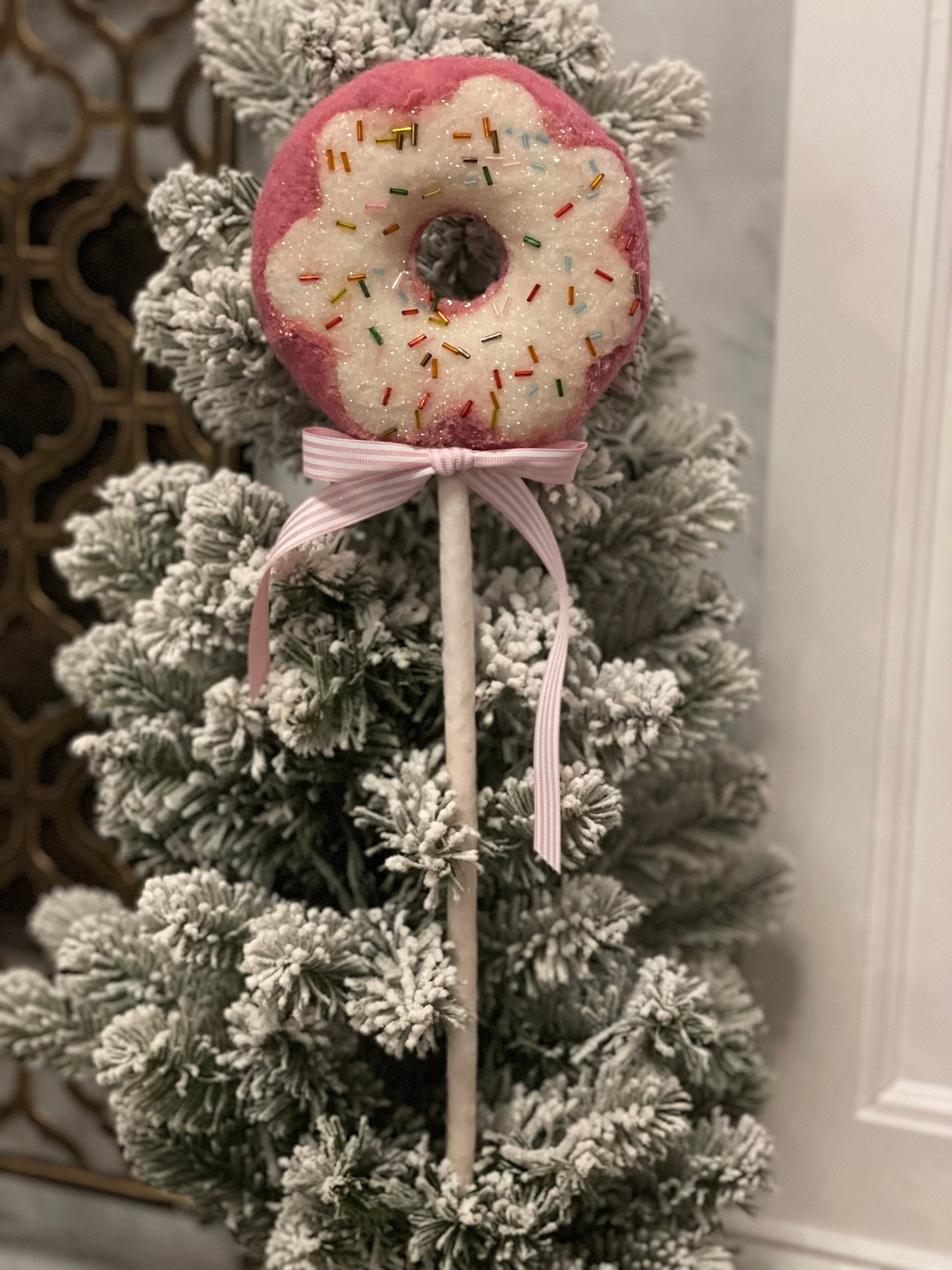 18” H x 5.5” D. Pink Dougnut pick ornament.