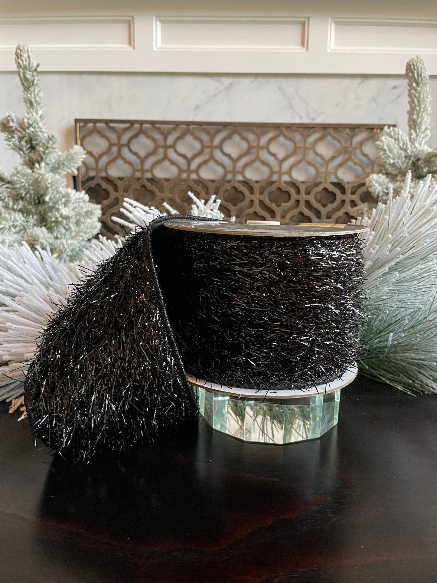 4"x5 yards tinsel ribbon black. Wired.