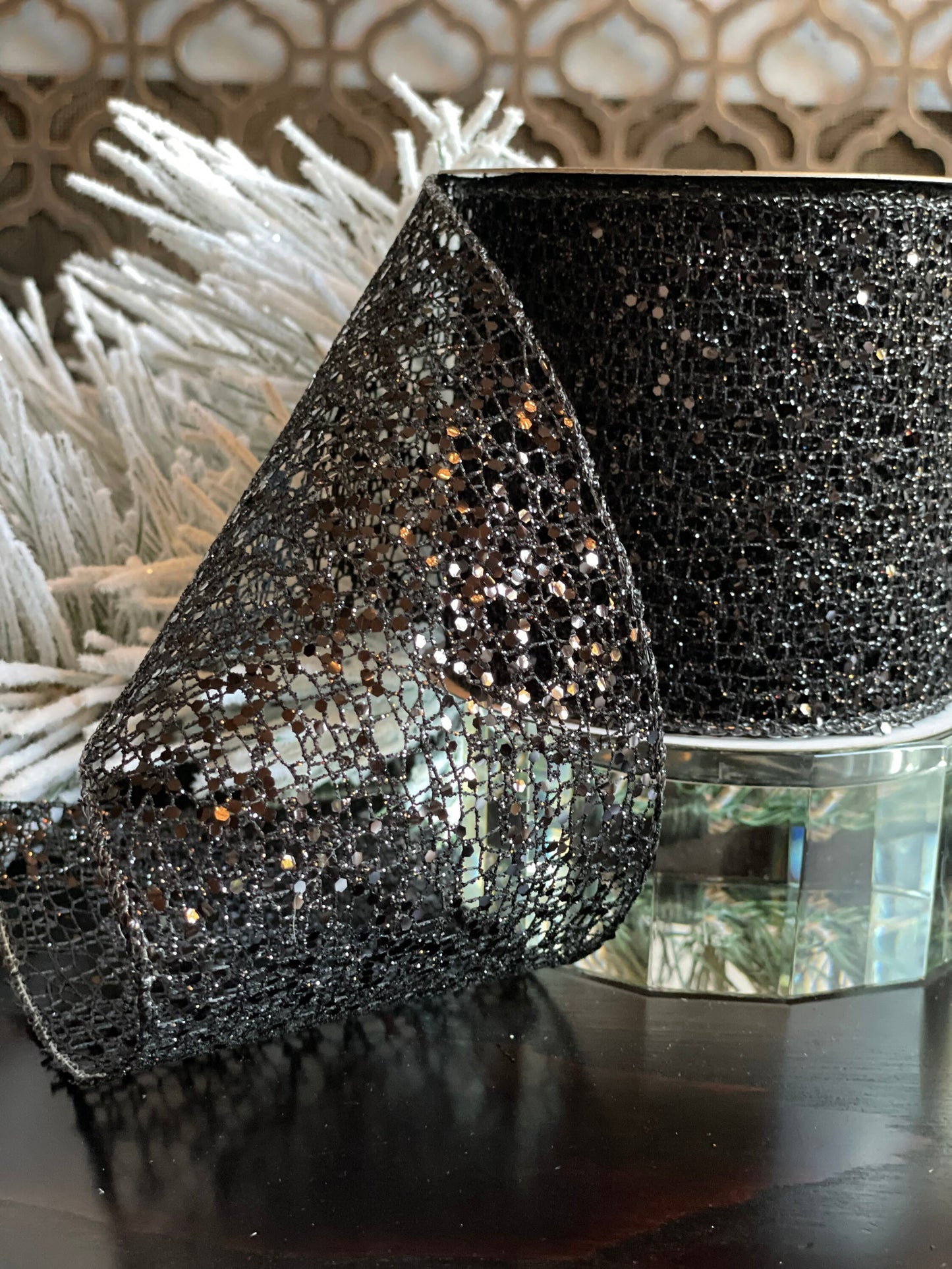 4"x10 yds. Black glitter mesh ribbon. Wired.