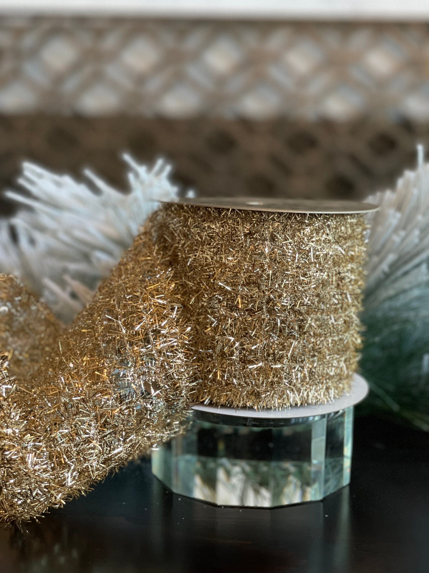 4"x10 yds. or 2.5”x 10yds. tinsel ribbon. Champagne. Wired.