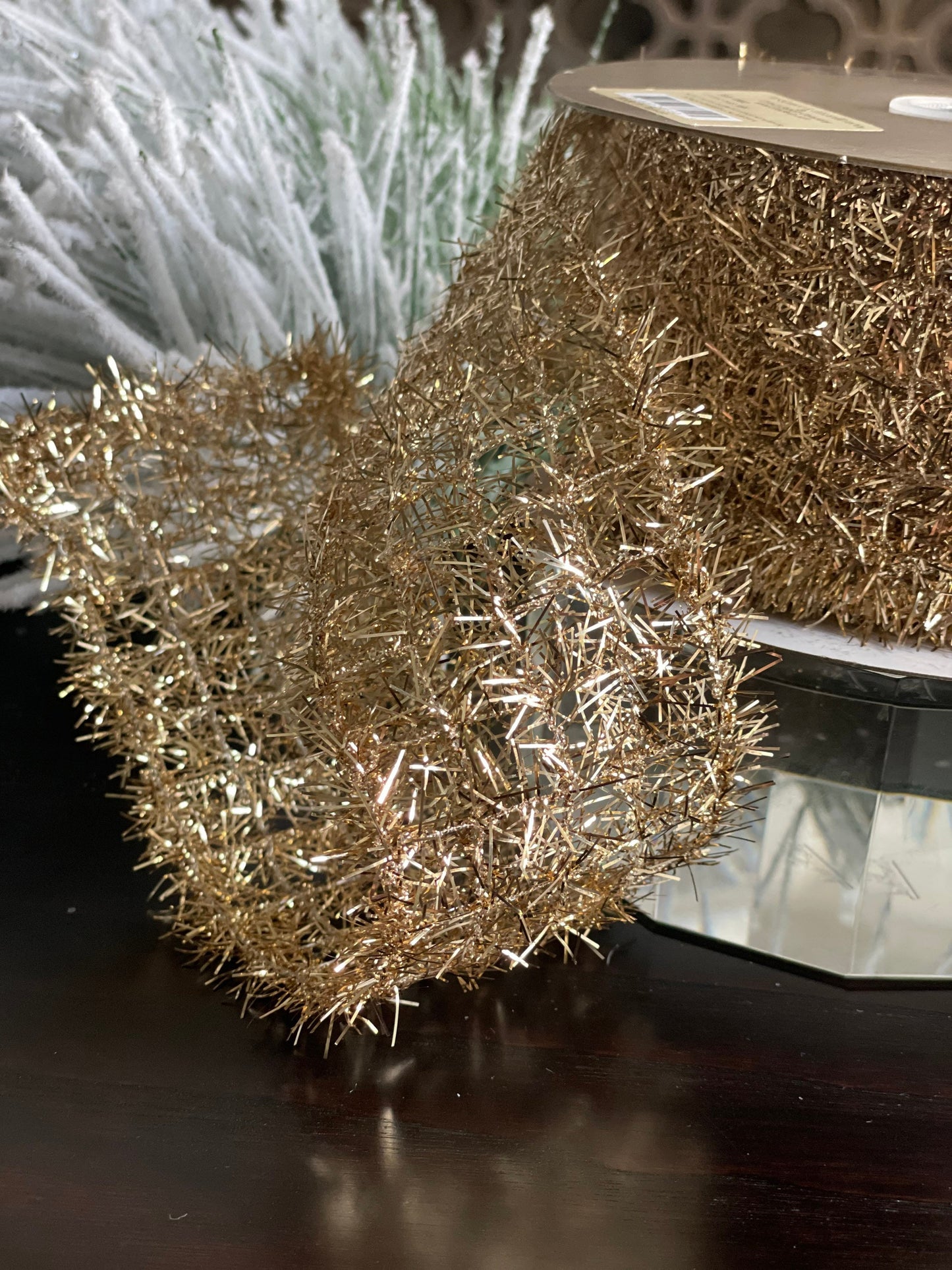 4"x10 yds. or 2.5”x 10yds. tinsel ribbon. Champagne. Wired.
