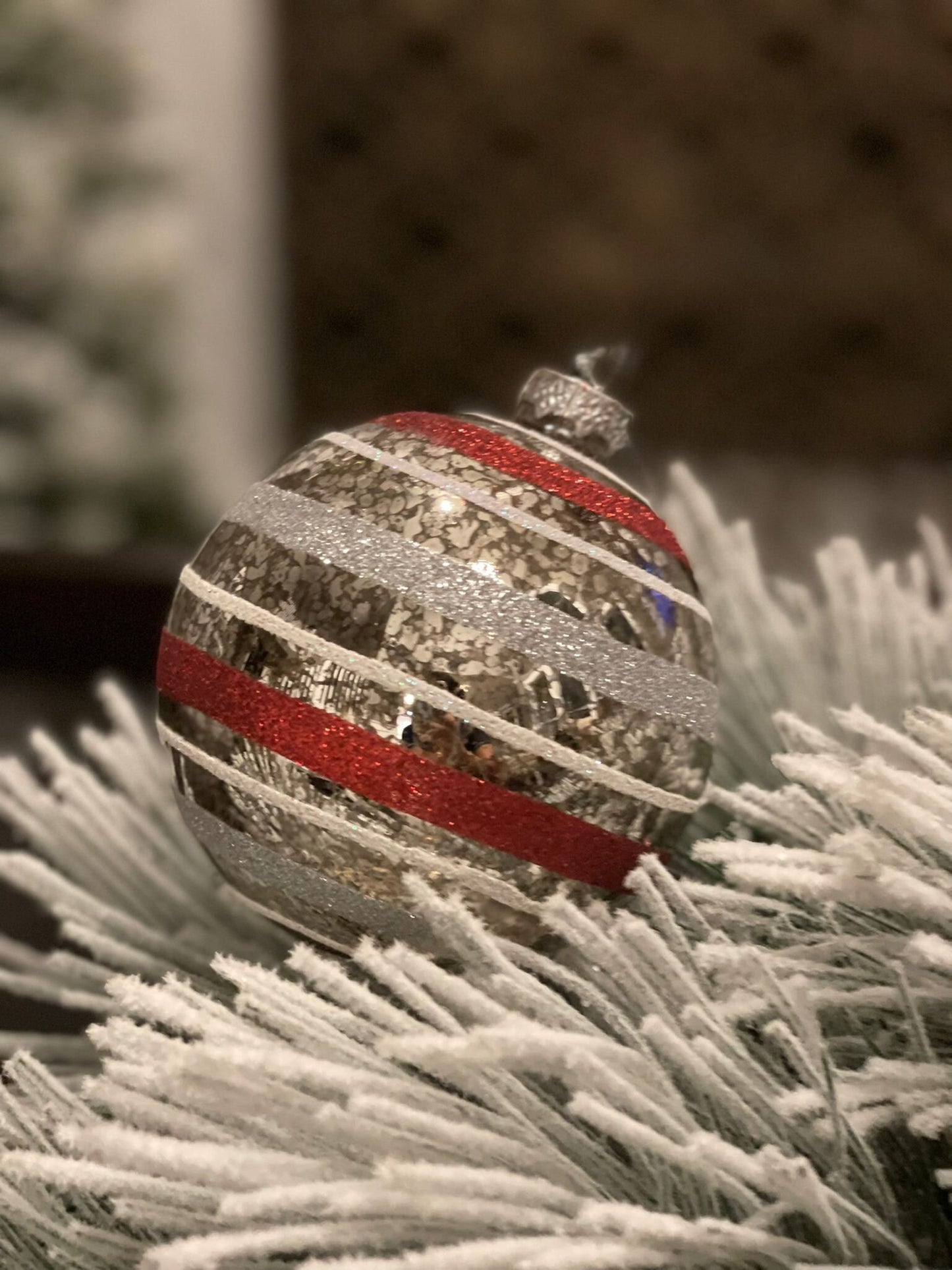 4" Striped glass ornament. Red and silver.