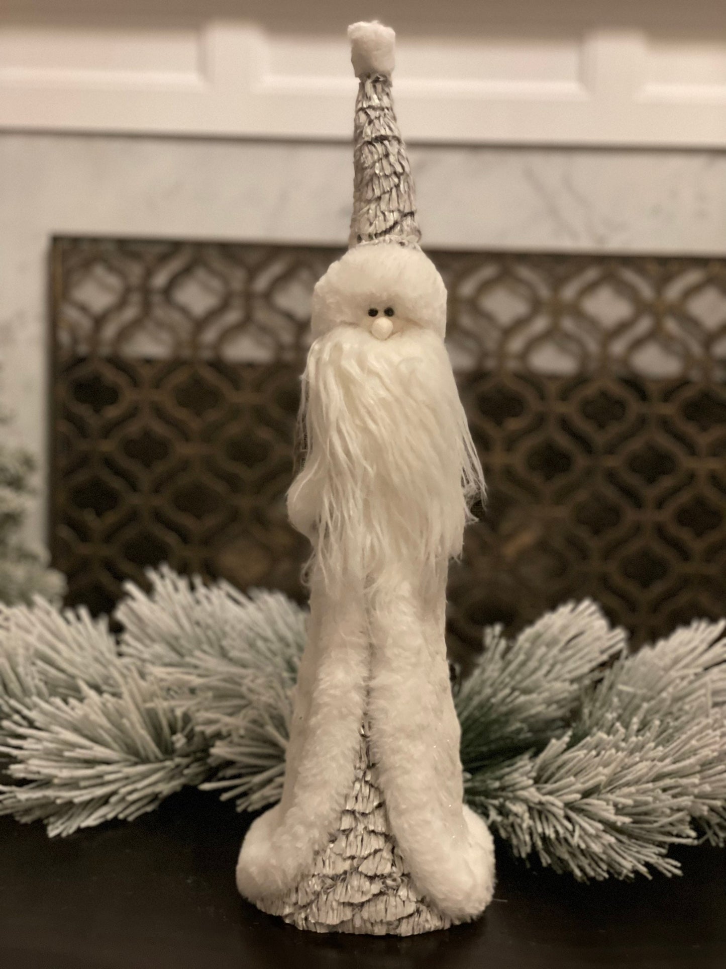22"x7" frosted artic santa standing.