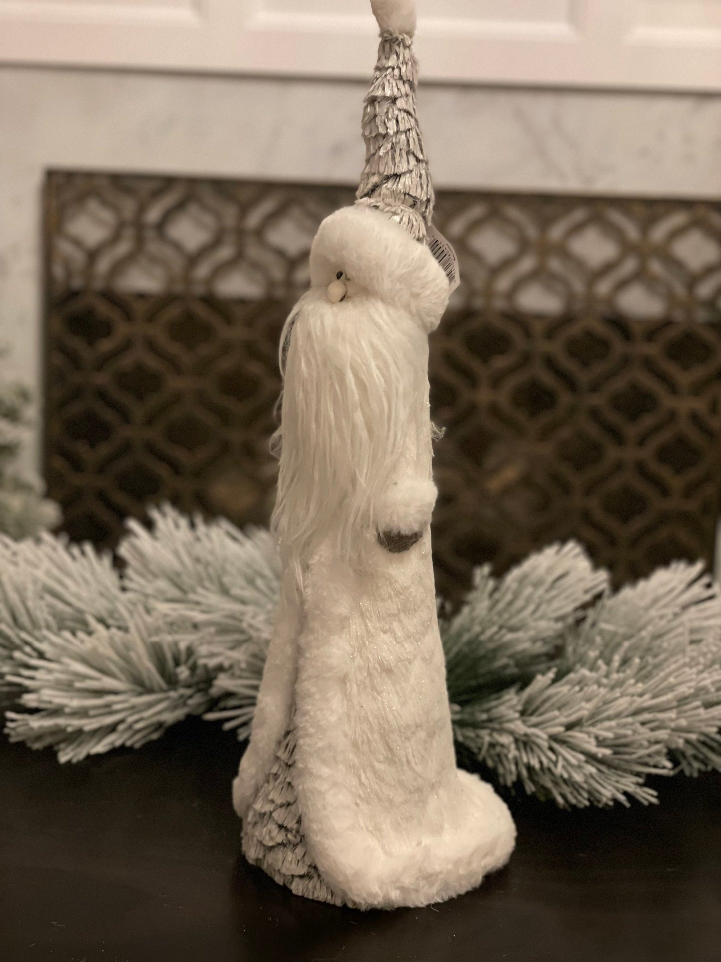 22"x7" frosted artic santa standing.