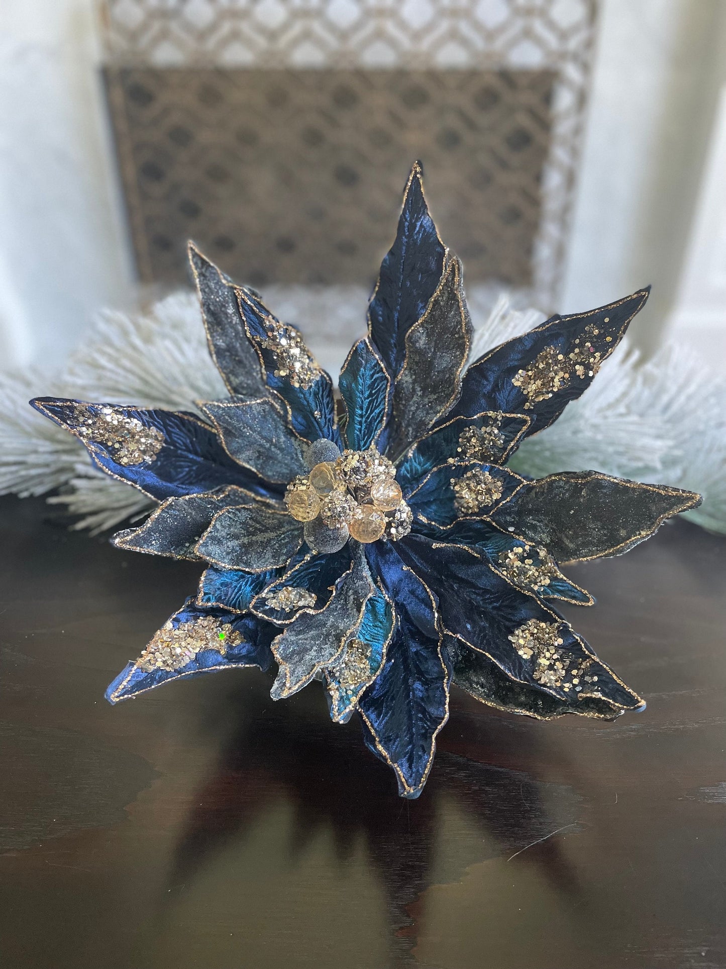17.5” Poinsettia clip sapphire rose gold. Beaded and glitter. 17.5” tip to tip.