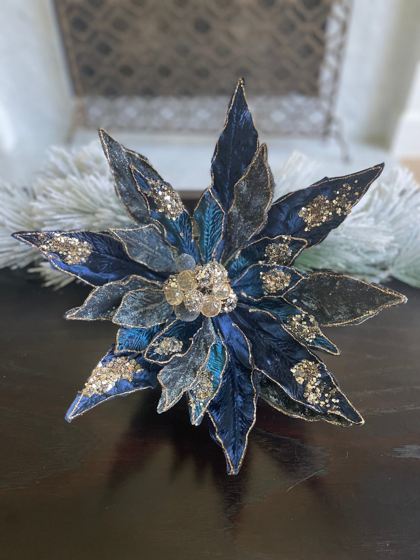 17.5” Poinsettia clip sapphire rose gold. Beaded and glitter. 17.5” tip to tip.