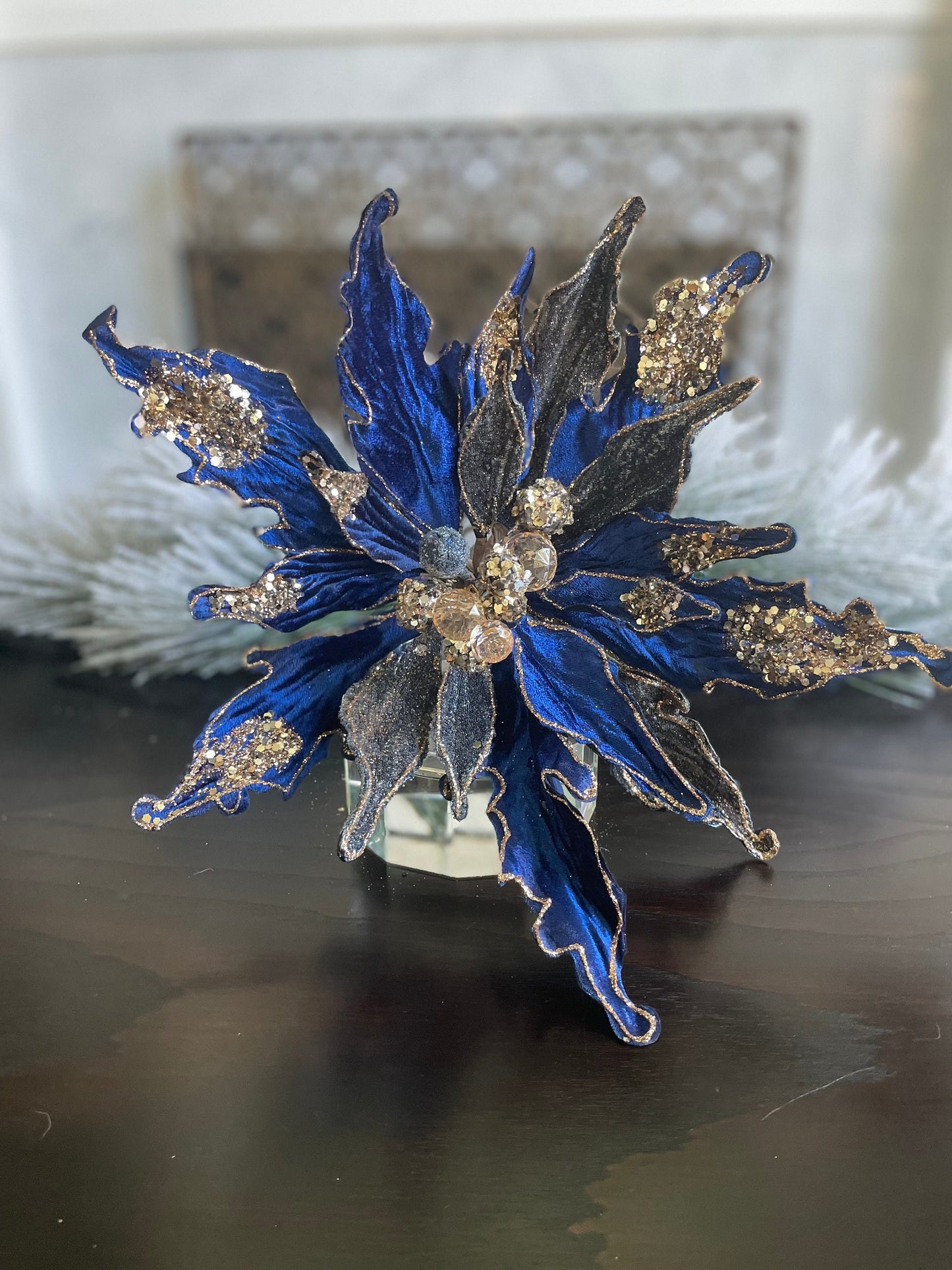 15” Poinsettia stem sapphire and rose gold glitter and beaded. 15” tip to tip.