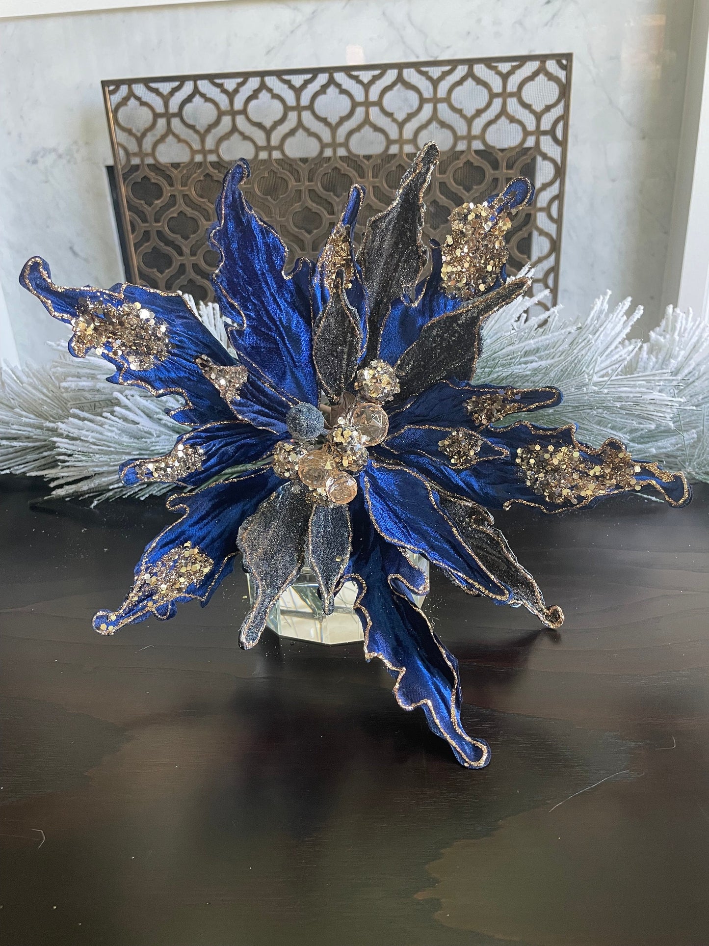 15” Poinsettia stem sapphire and rose gold glitter and beaded. 15” tip to tip.