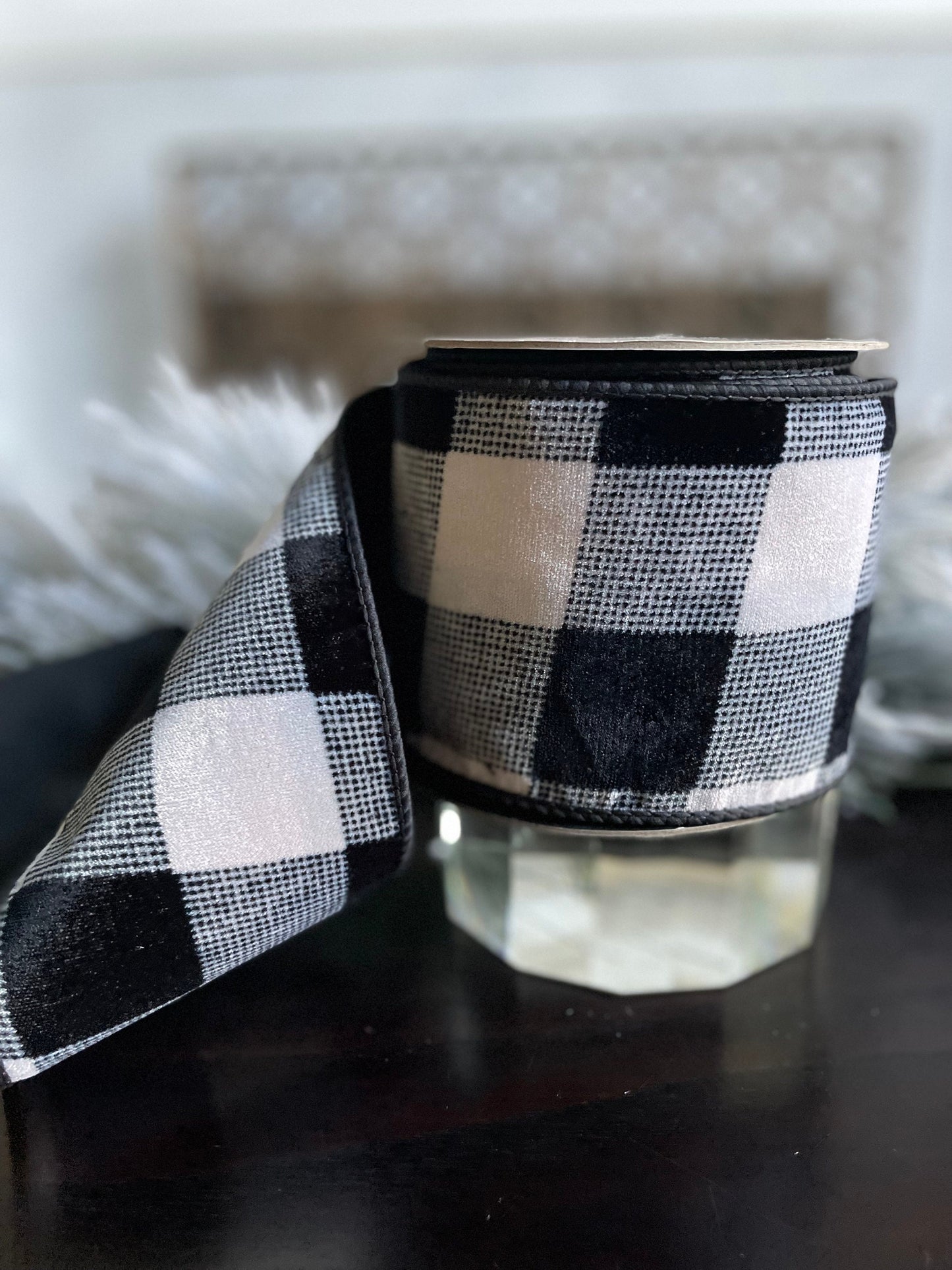 4” x 10 yds. Designer velvet buffalo check black- cream ribbon. Black back ribbon. Wired. D. Stevens.