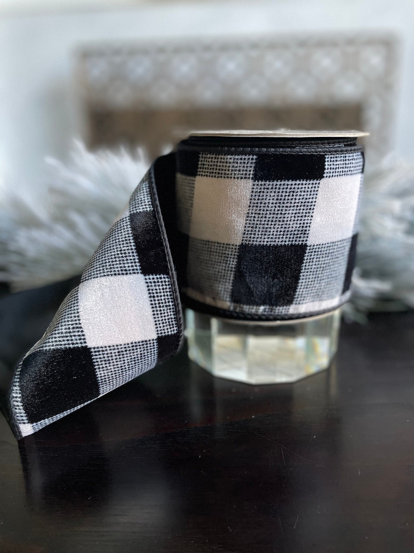 4” x 10 yds. Designer velvet buffalo check black- cream ribbon. Black back ribbon. Wired. D. Stevens.
