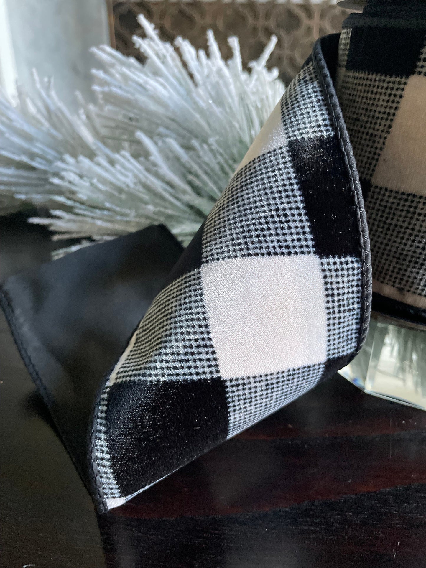 4” x 10 yds. Designer velvet buffalo check black- cream ribbon. Black back ribbon. Wired. D. Stevens.