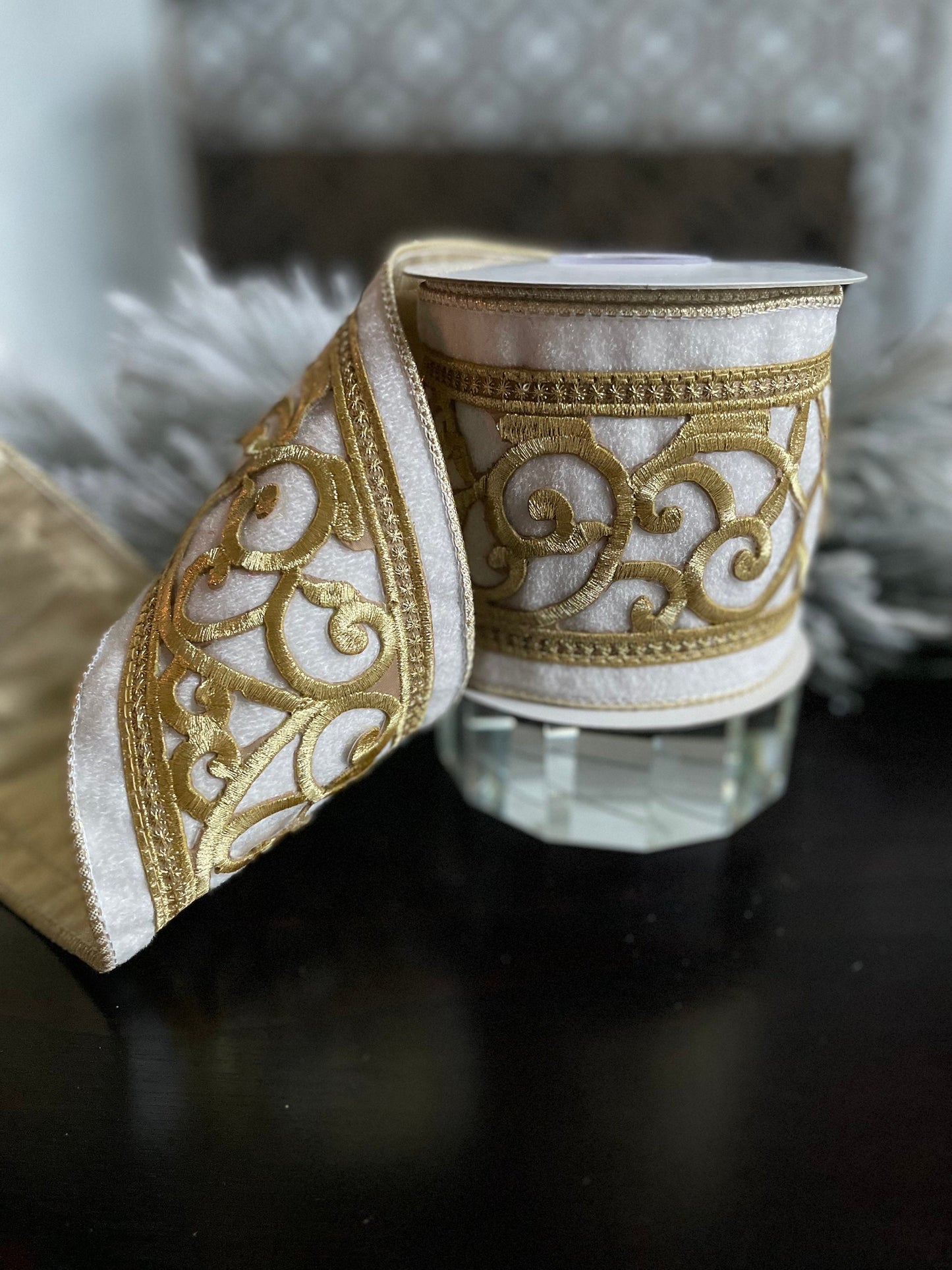 4” x 5 yds. Designer ivory and gold trim on velvet ribbon. Wired. Regency.