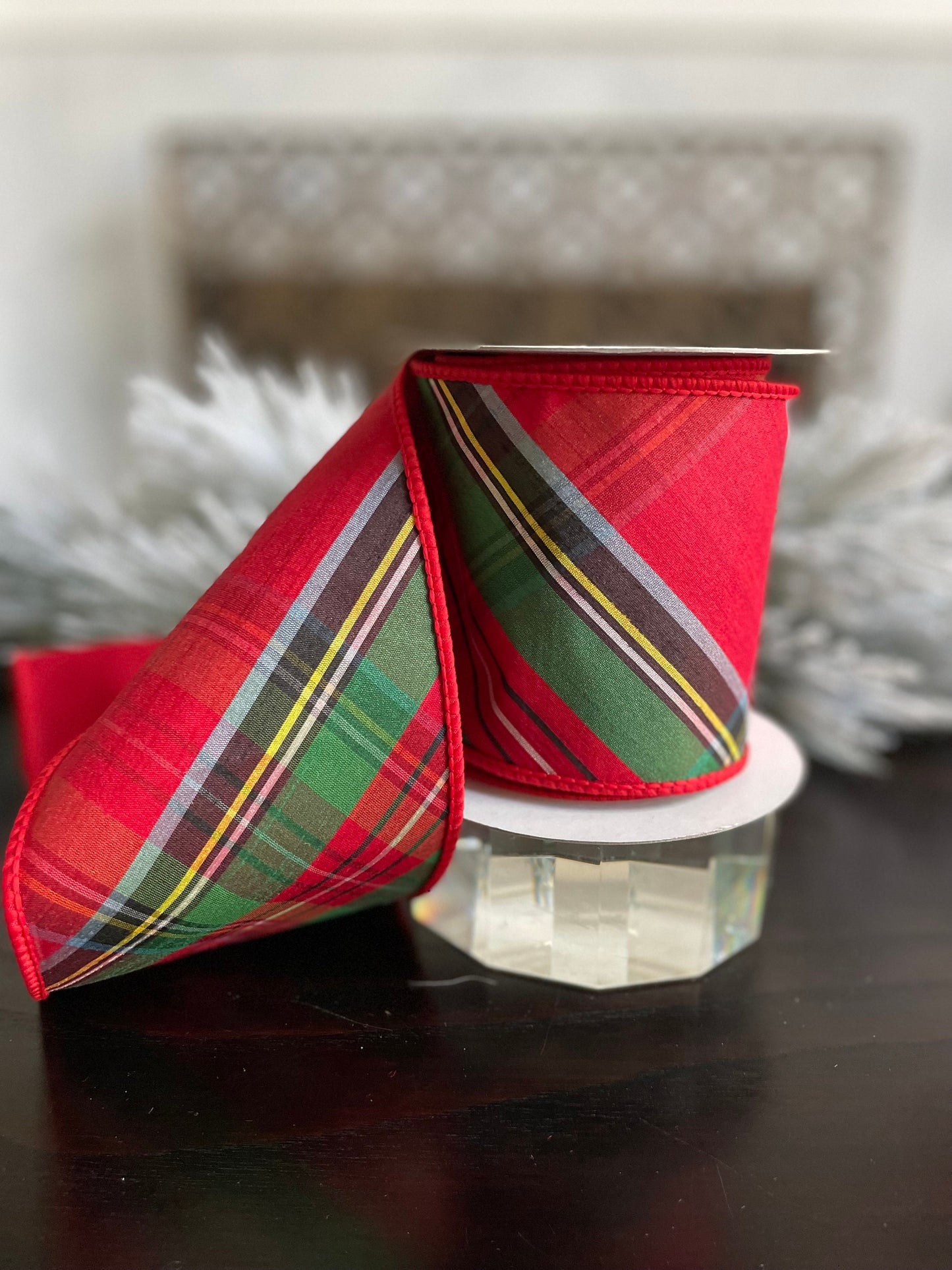 4” x 5 yds. Designer diagonal cut plaid dupion fused ribbon. Red, green, white, yellow, black. Wired. Regency.