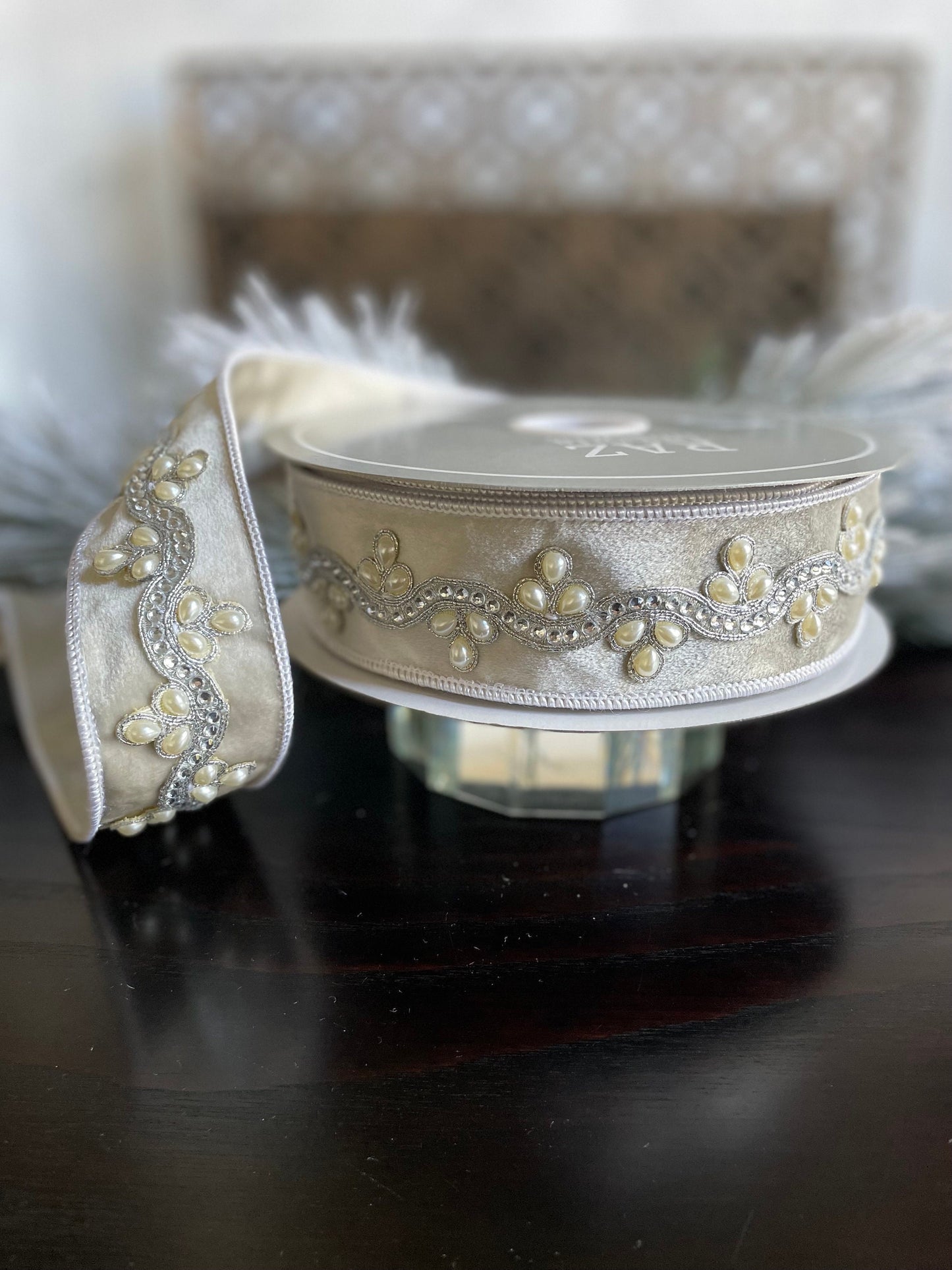 2” x 10 yds. Designer jeweled ivory velvet wired ribbon. Raz.