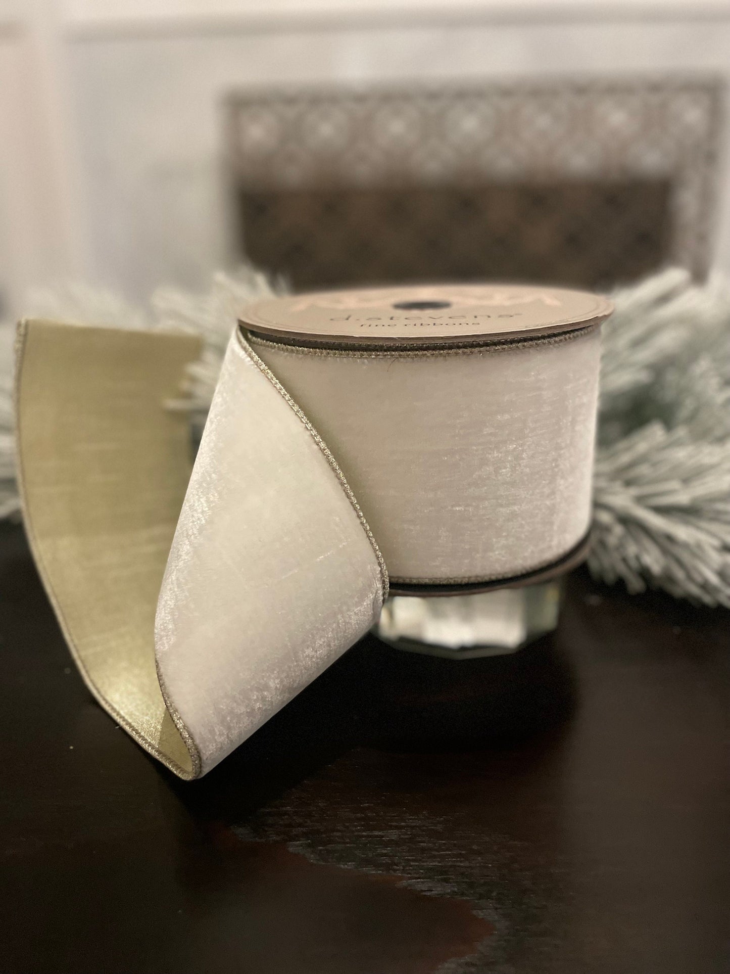 4” x 10 yds. Designer lush velvet winter white, metallic platinum back ribbon. Wired. D. Stevens.