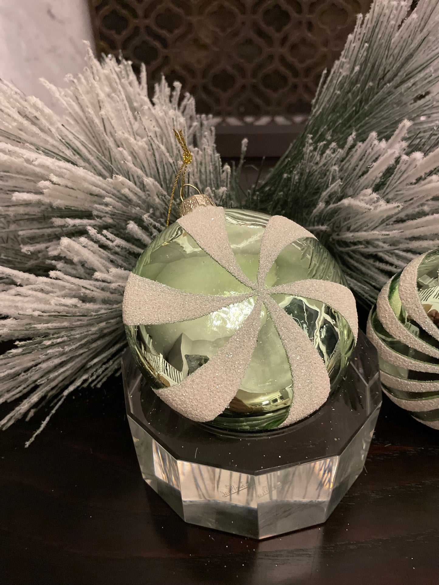 Set of 2. 4" glass peppermint candy disk ornament. Green and white.