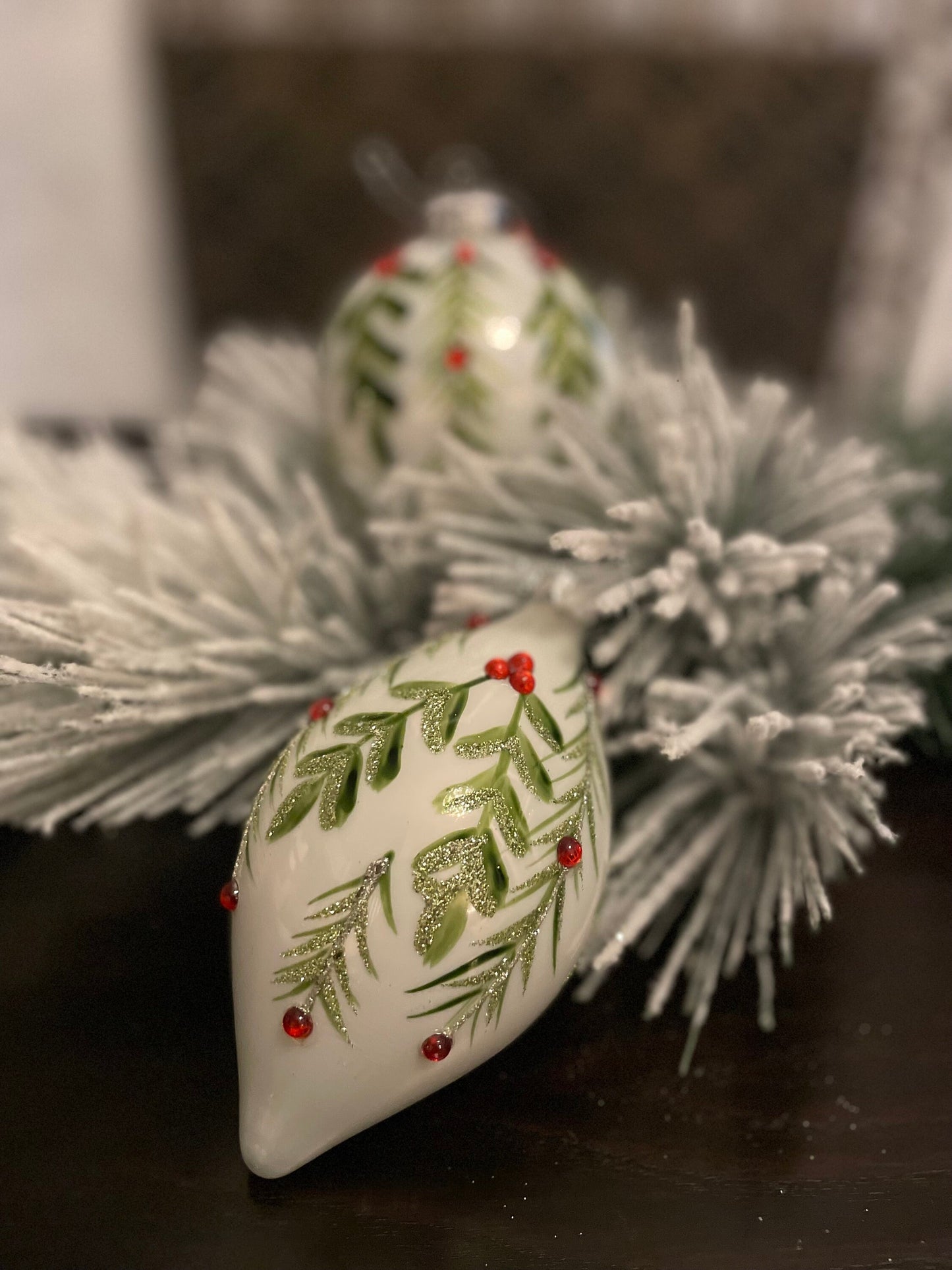 Set of 2. 4”-6” Glass berry/leaf final and ball ornaments. White, green and red.
