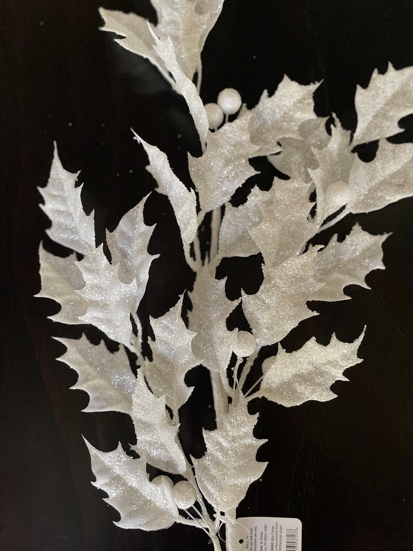 29” White glittered holly spray.