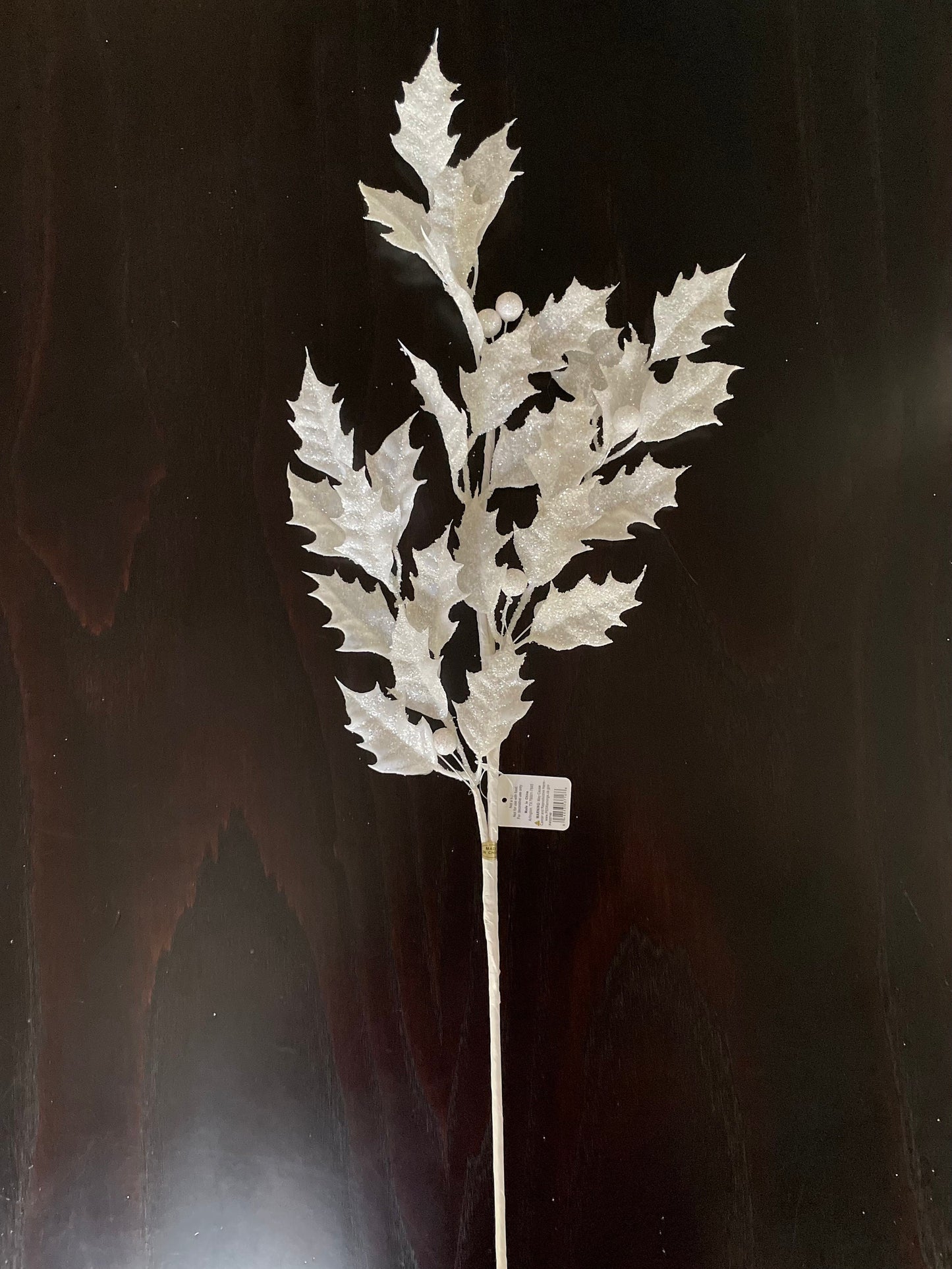 29” White glittered holly spray.