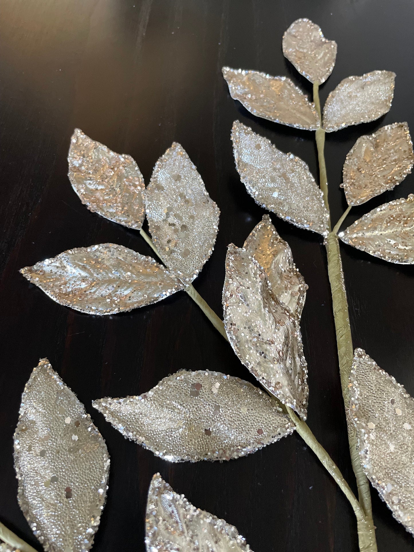 29” Champagne glittered leaf spray.