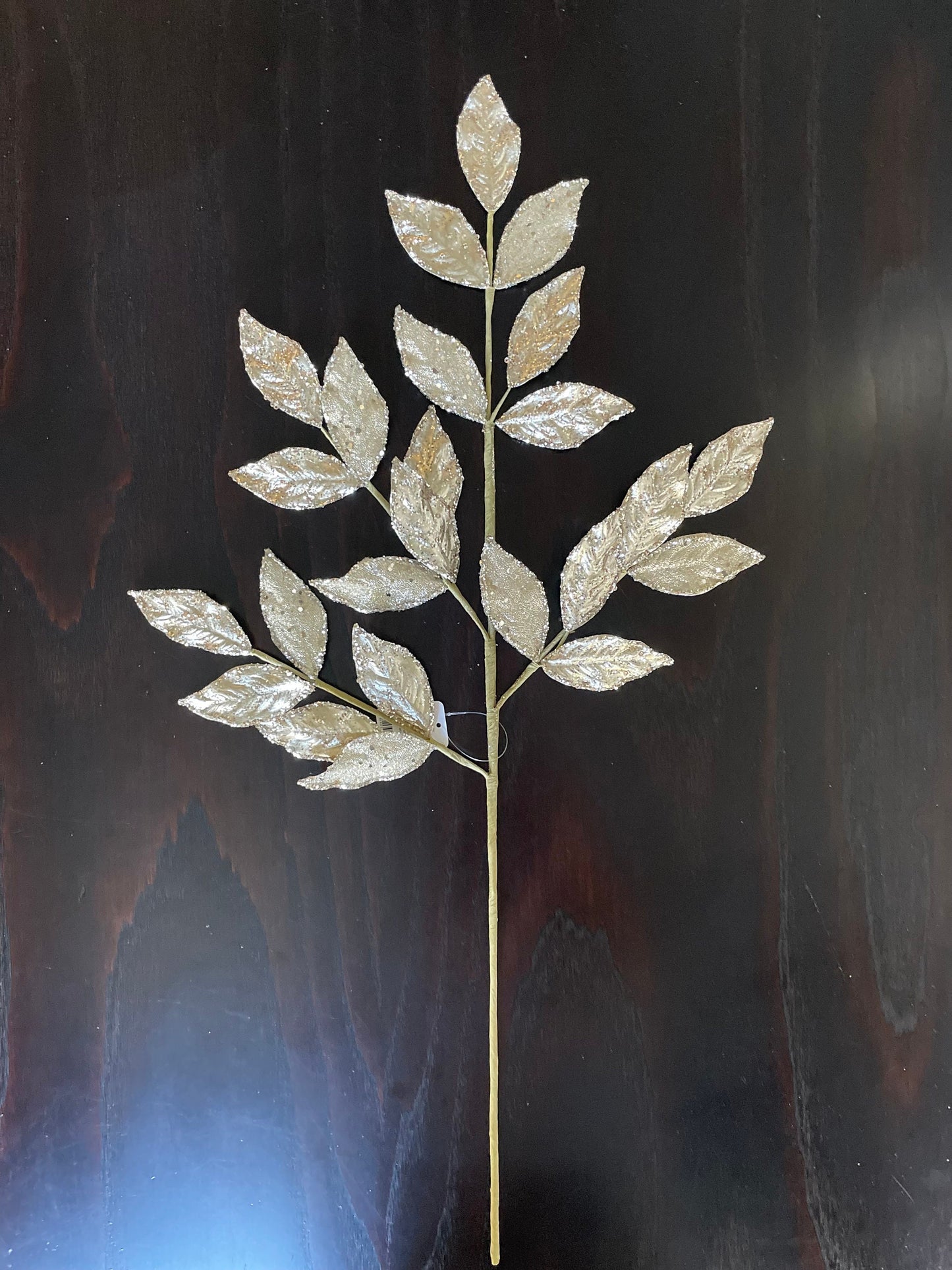 29” Champagne glittered leaf spray.