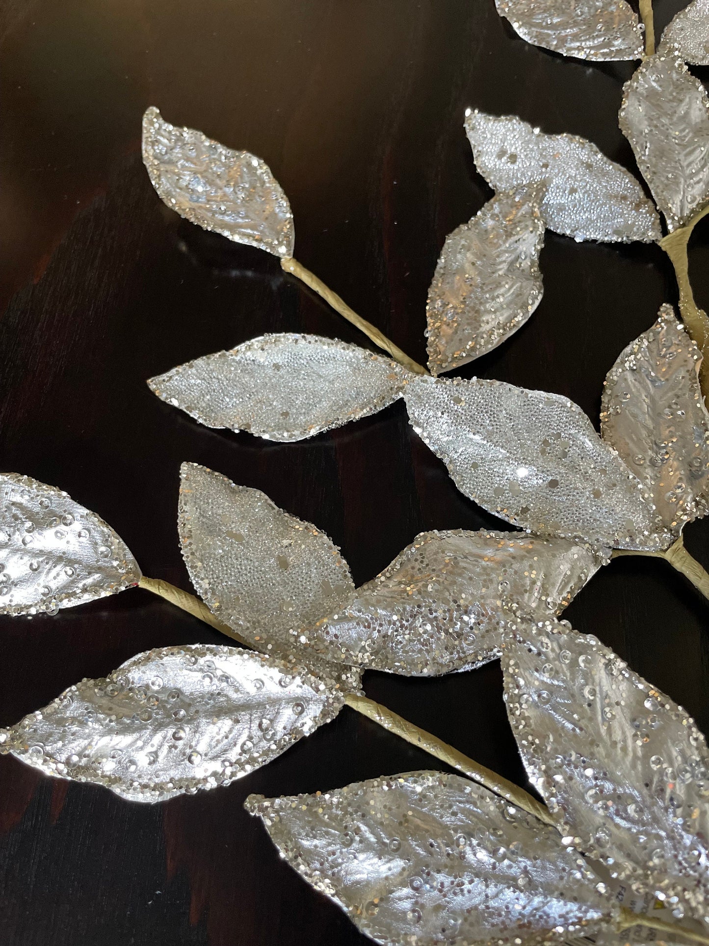 29” Glittered silver leaf spray.