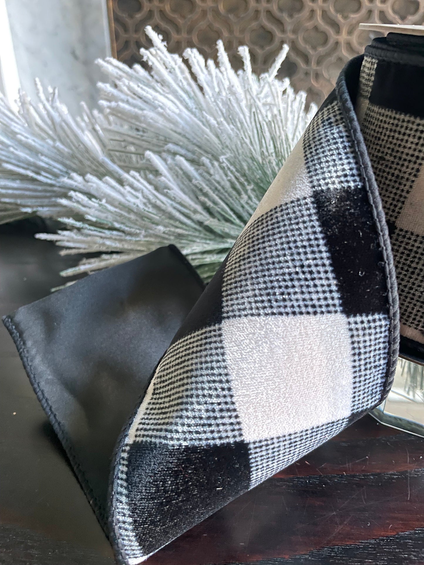 4” x 10 yds. Designer velvet buffalo check black- cream ribbon. Black back ribbon. Wired. D. Stevens.