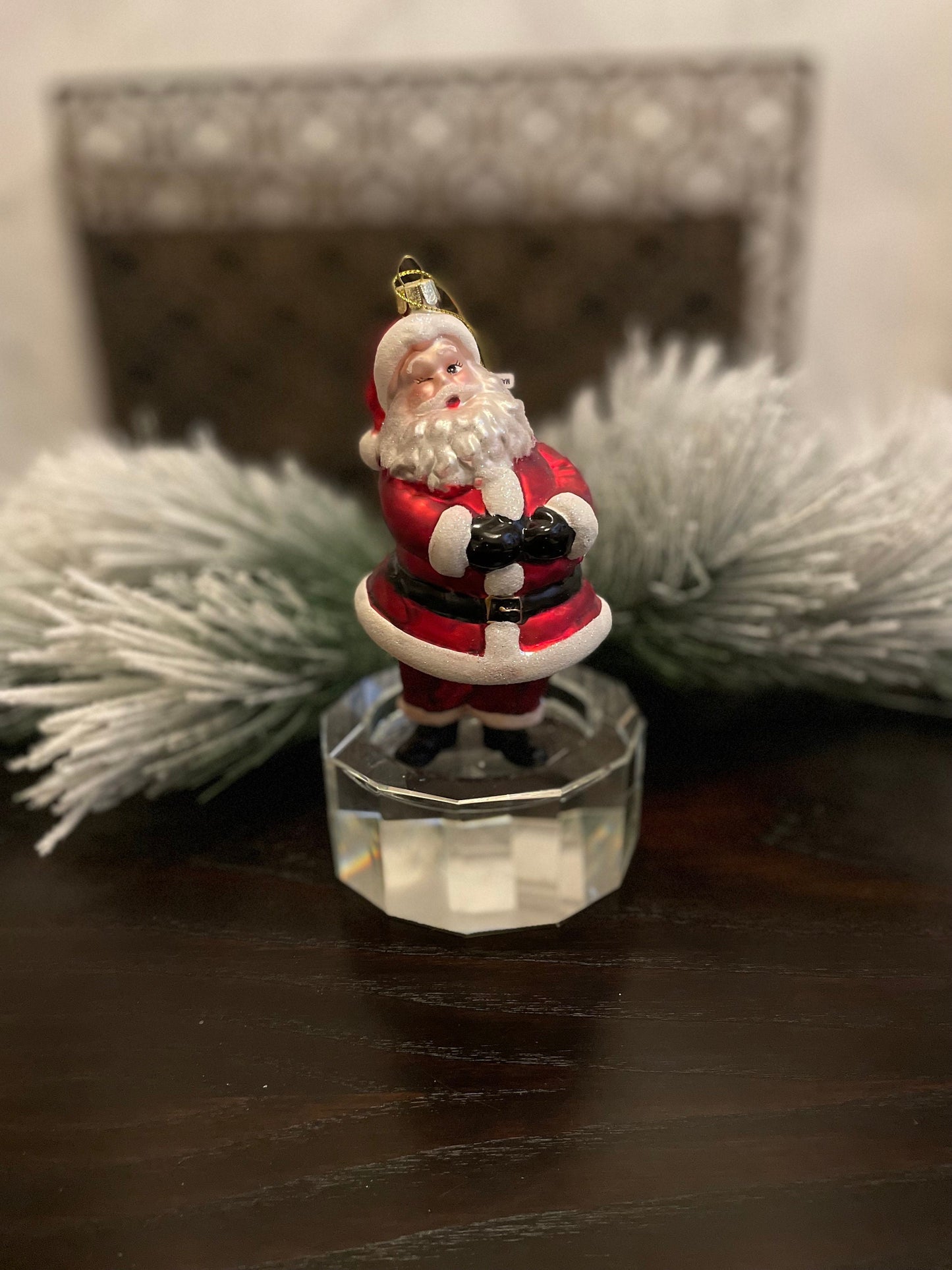 6" glass wink santa ornament.