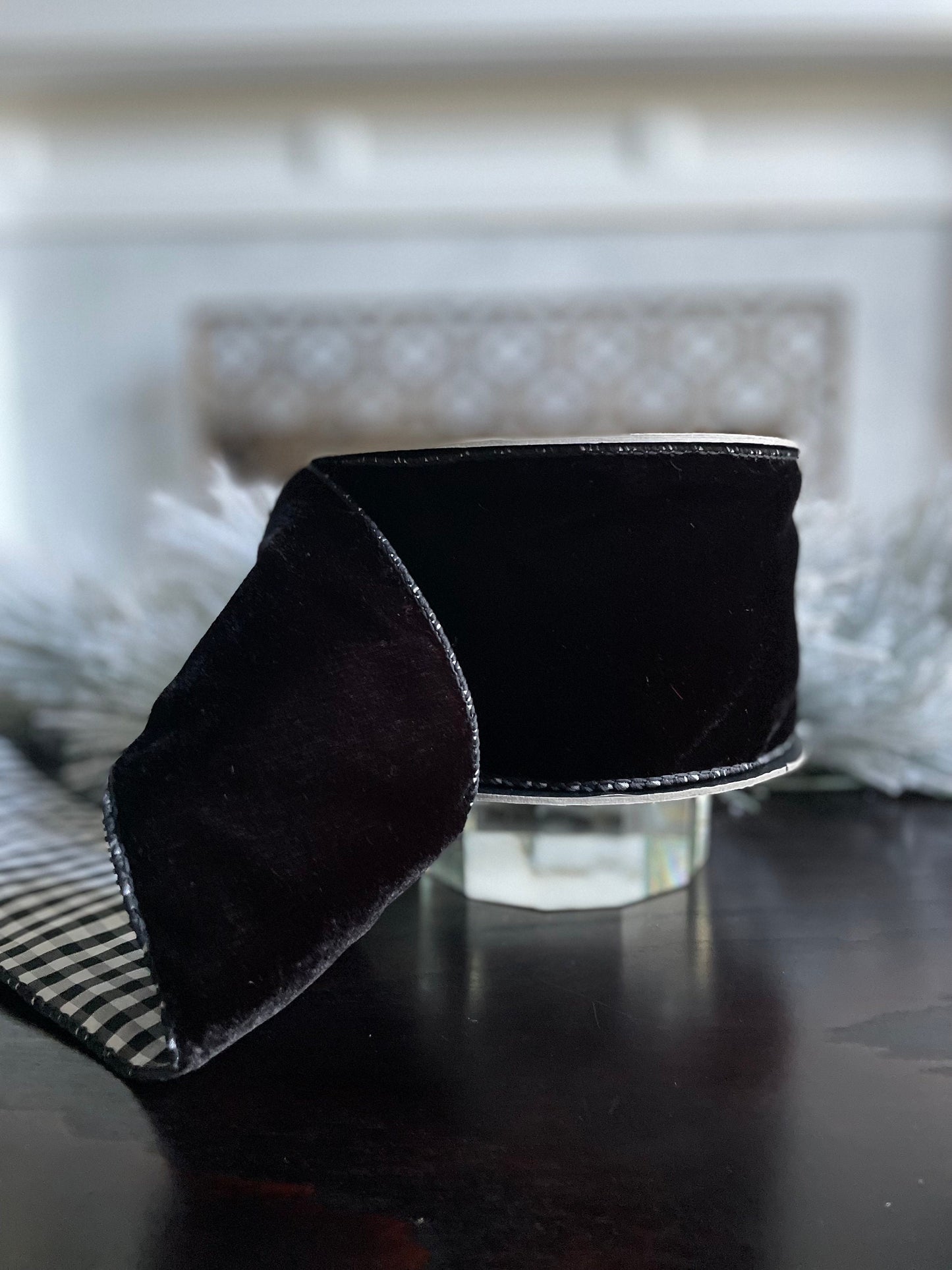 4” x 10 yds. Designer black velvet and taffeta check back ribbon. Wired. D. Stevens.