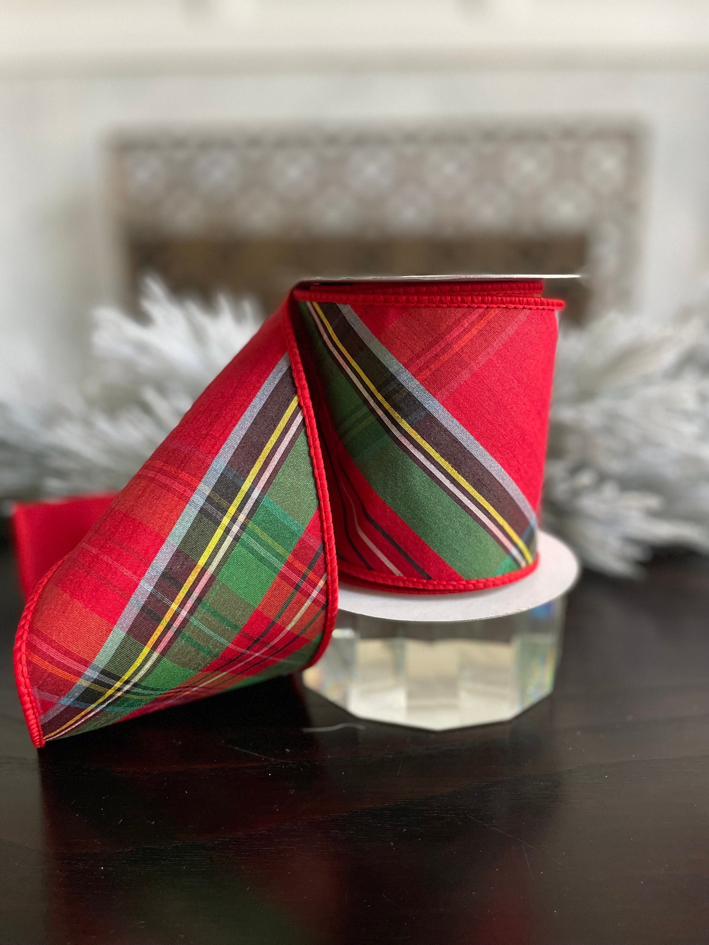 4” x 5 yds. Designer diagonal cut plaid dupion fused ribbon. Red, green, white, yellow, black. Wired. Regency.