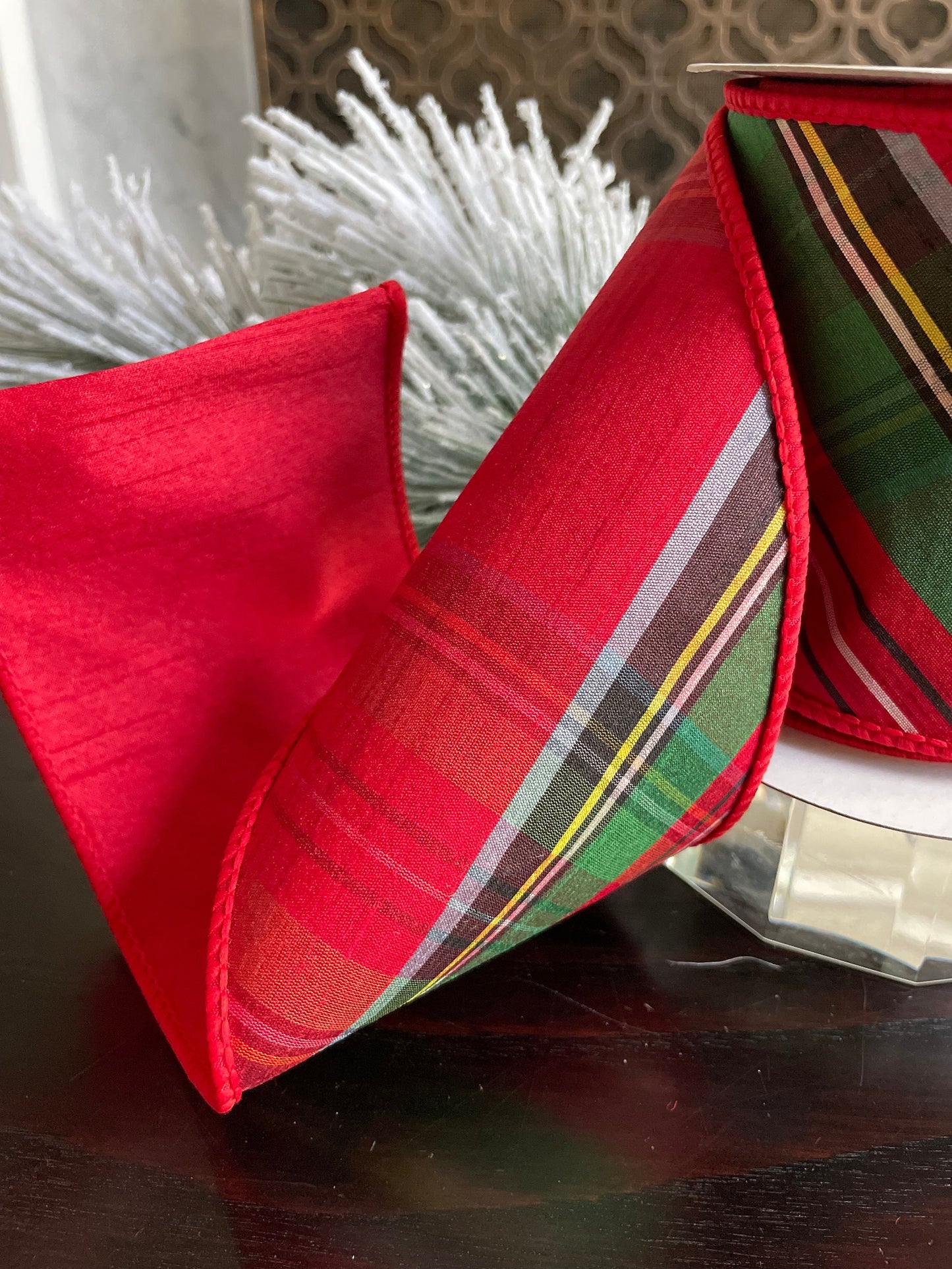 4” x 5 yds. Designer diagonal cut plaid dupion fused ribbon. Red, green, white, yellow, black. Wired. Regency.