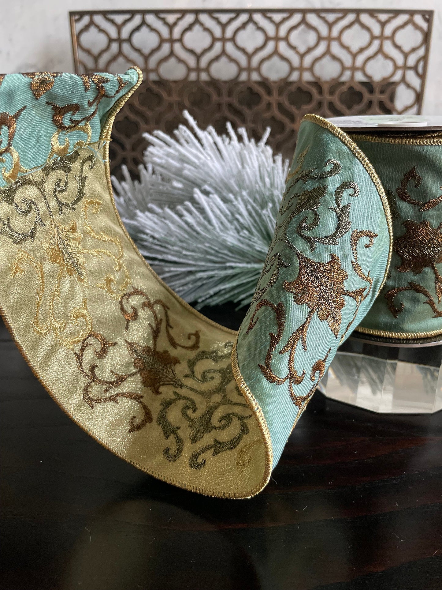 4” x 5 yds. Designer aqua and gold embroidered leaf filigree ribbon. Wired. Regency.