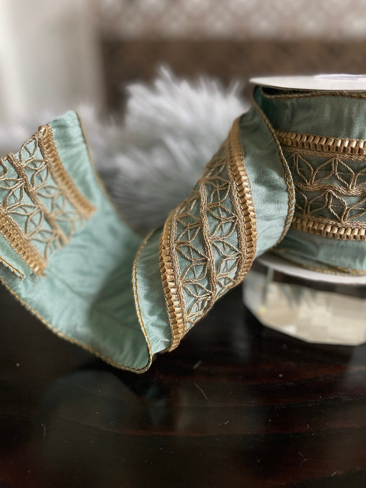 4” x 5 yds. Designer aqua and metallic gold trim dupion ribbon. Wired. Regency.
