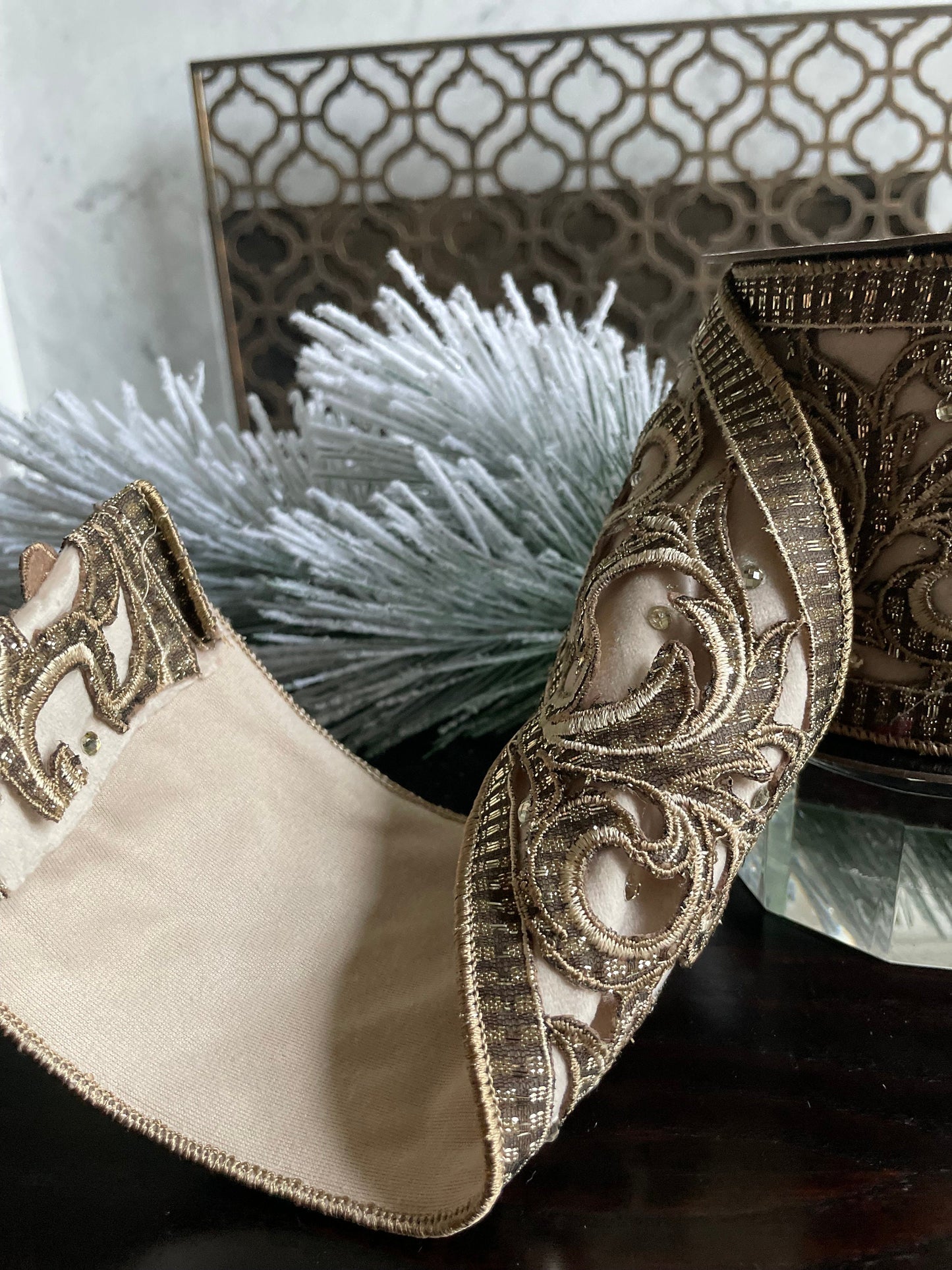 4” x 5 yds. Designer champagne embroidered scroll velvet ribbon. Wired. Regency.