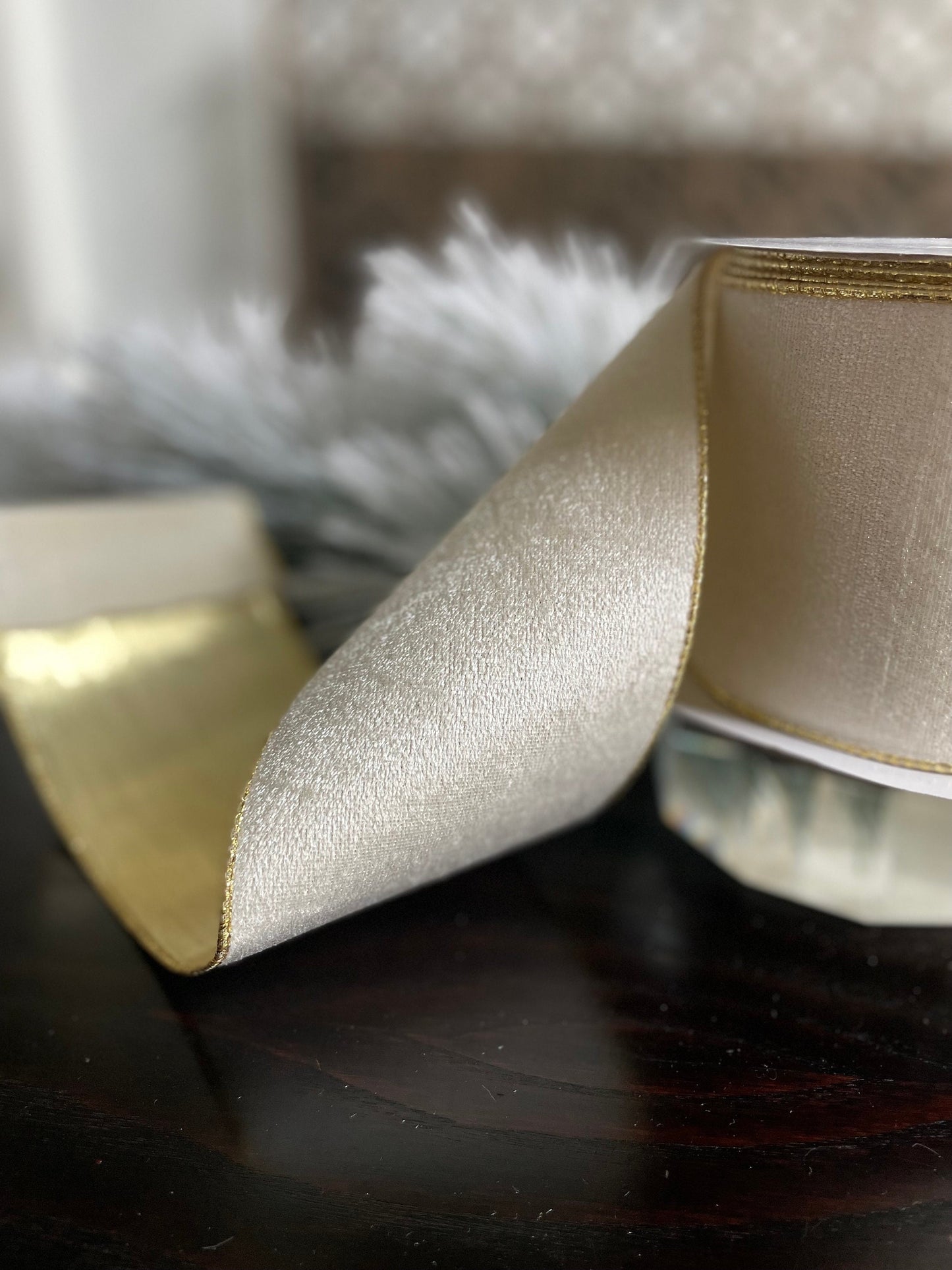 4” x 10 yds. White velvet and metallic gold back ribbon. Wired. Regency.