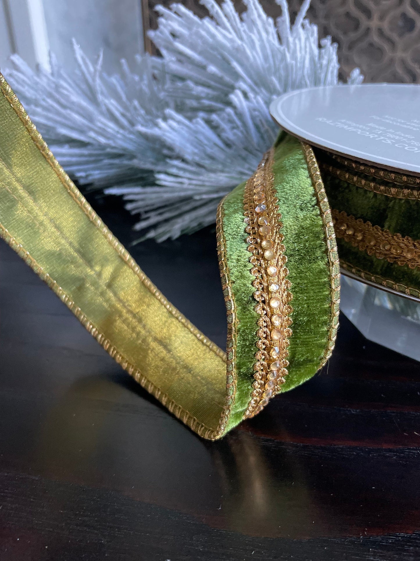 1.5” x 10 yds. Designer ribbon jeweled green velvet. Wired. Raz.