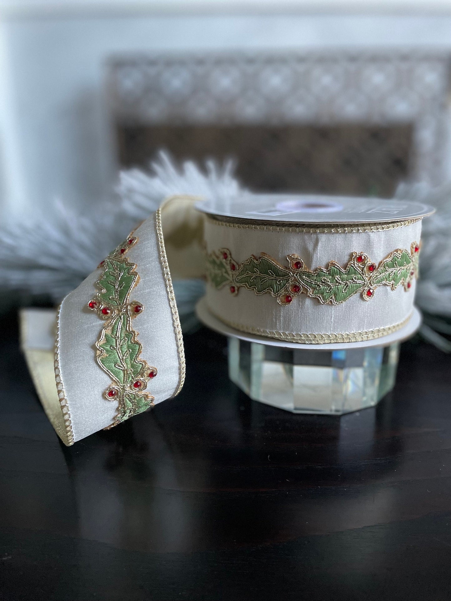 2.5” x 10 yds. Designer holly leaf wired ribbon. Raz.