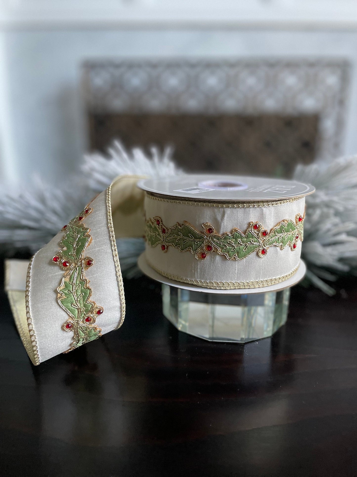 2.5” x 10 yds. Designer holly leaf wired ribbon. Raz.