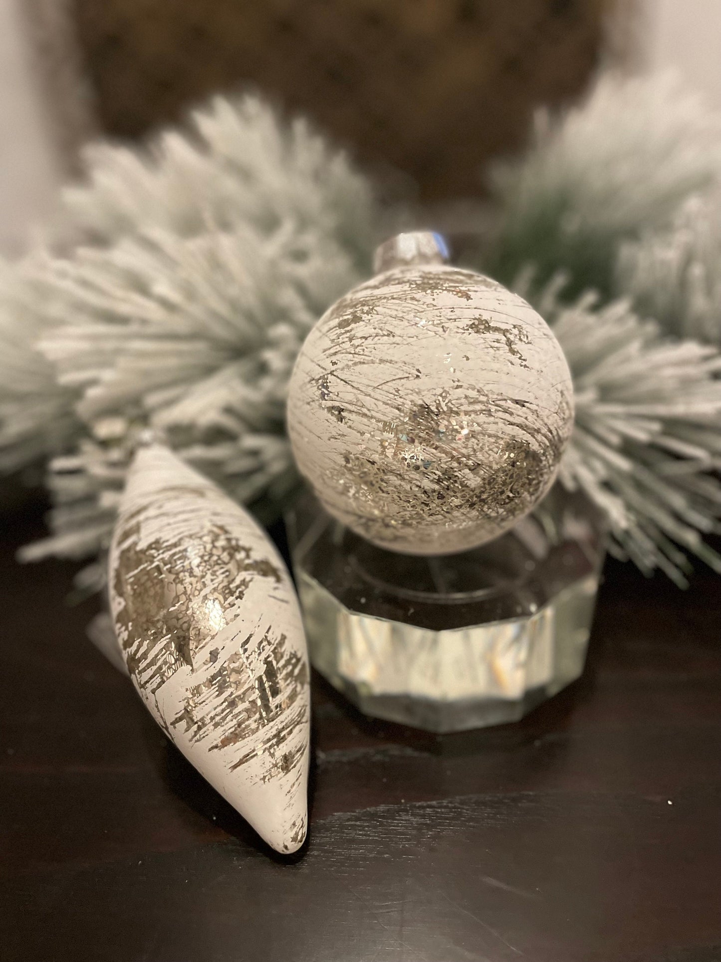 Set of 2. 4”-6” glass whitewash mercury ball and finial.