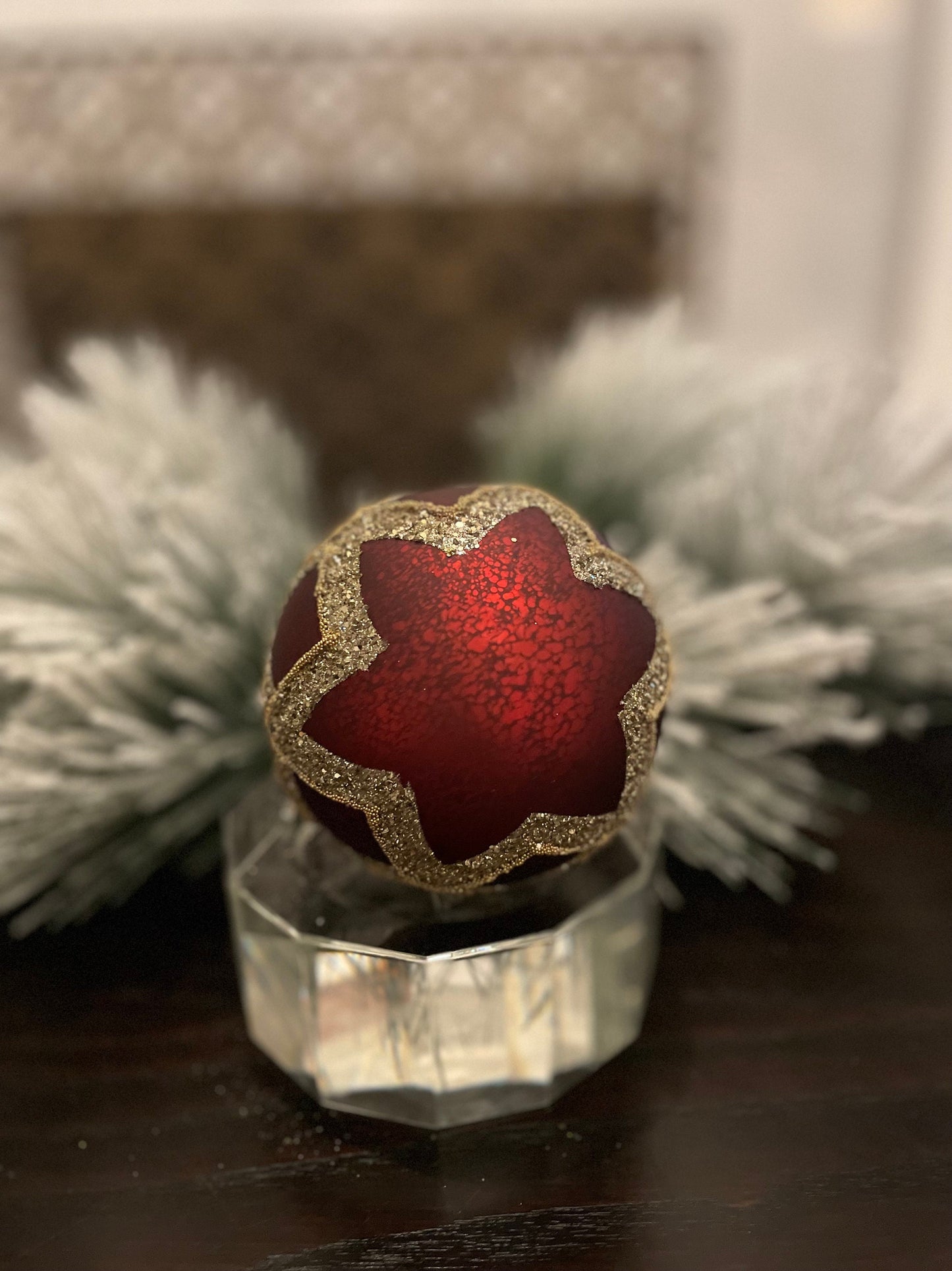 Set of 2. 4” glass gilded cranberry ball ornament.