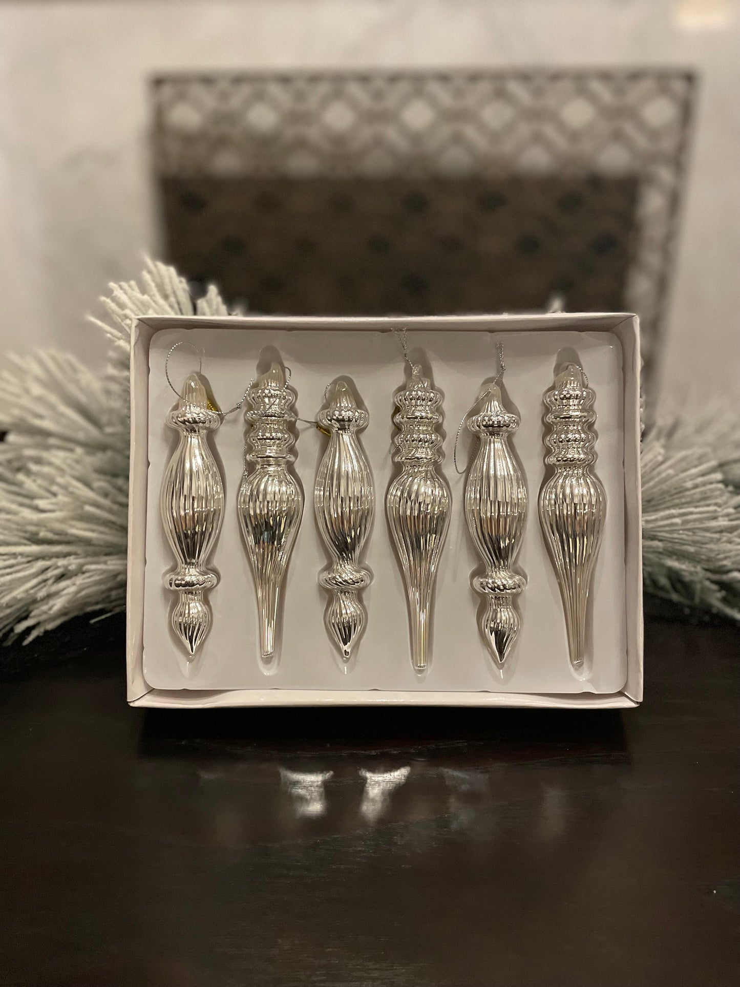 6.5” Box of silver finial ornaments. Glass. Set of 6.