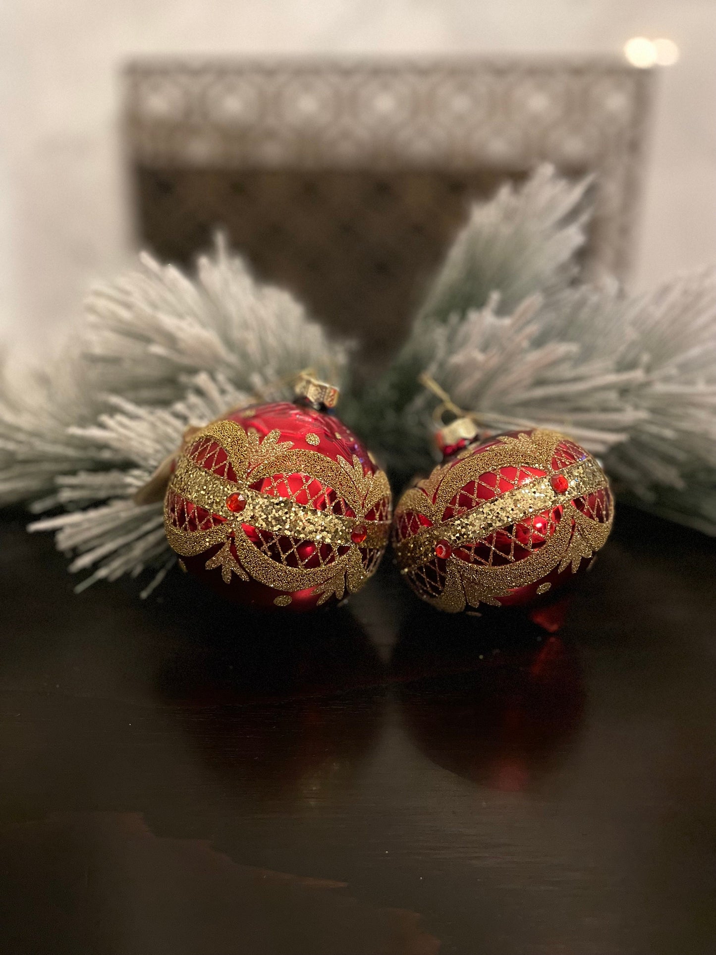 Set of 2. 4" Glass garland draped ball and finial ornament.