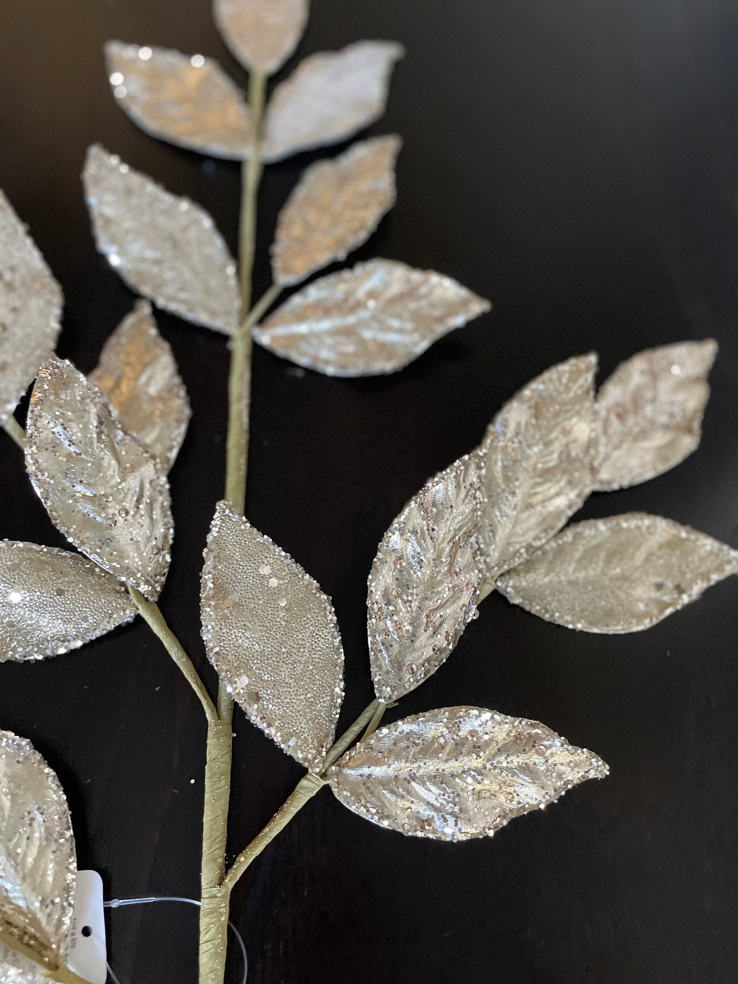 29” Champagne glittered leaf spray.